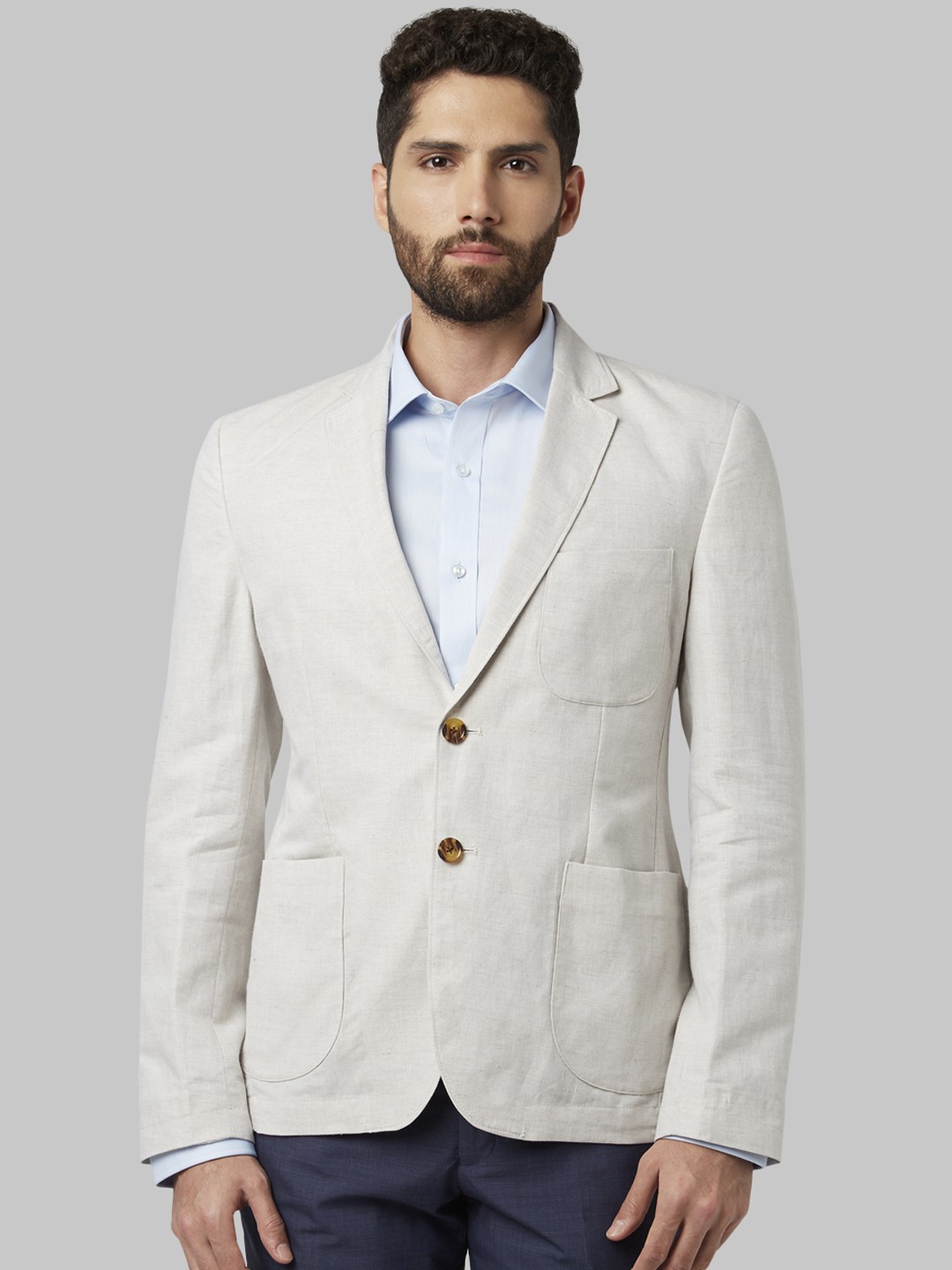 

Park Avenue Men Beige Solid Slim Fit Single-Breasted Blazer