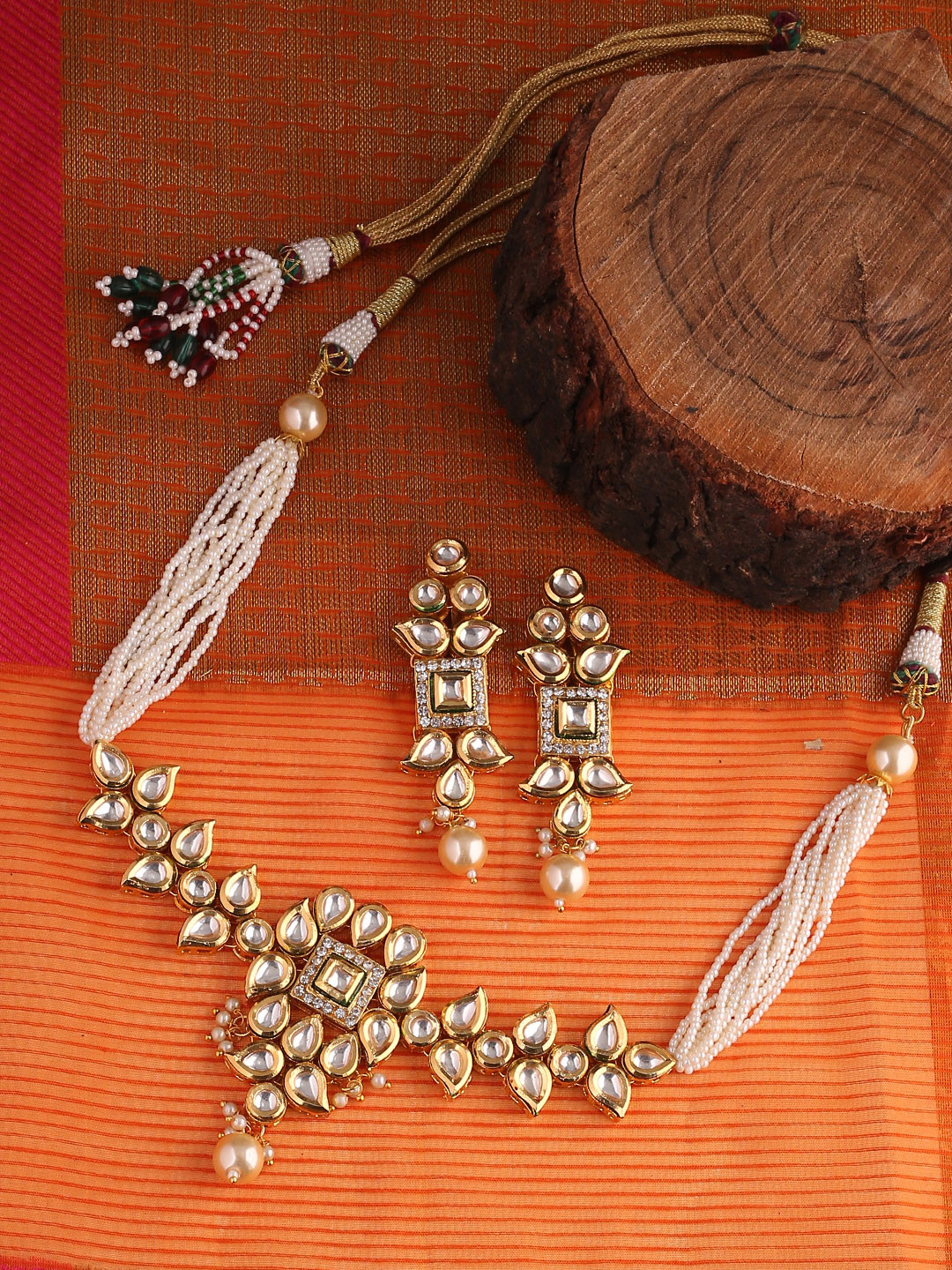 

Shoshaa Women Gold-Toned & Off-White Handcrafted Kundan Jewellery Set