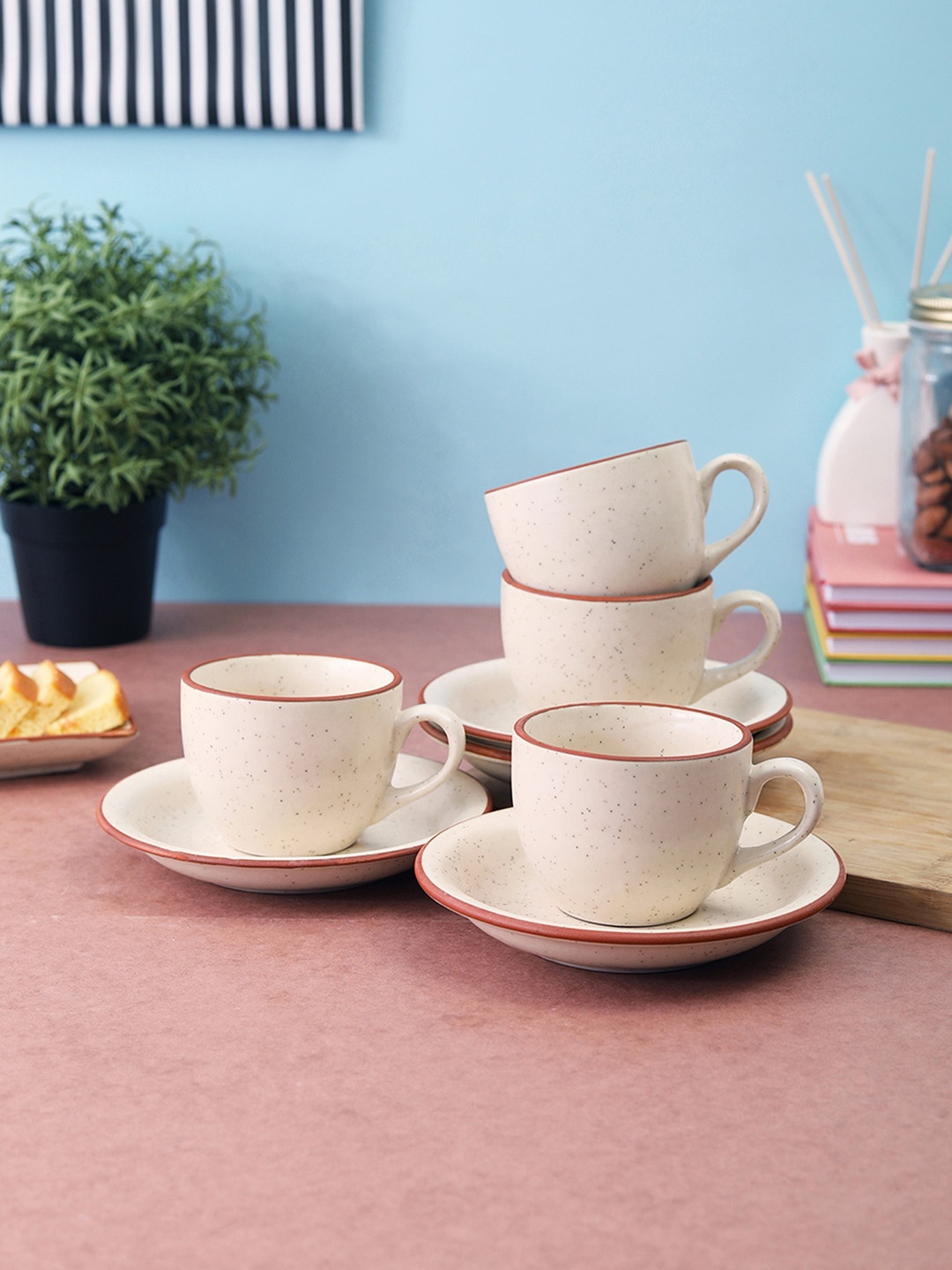 

VarEesha Set of 4 White Solid Ceramic Cups and Saucers