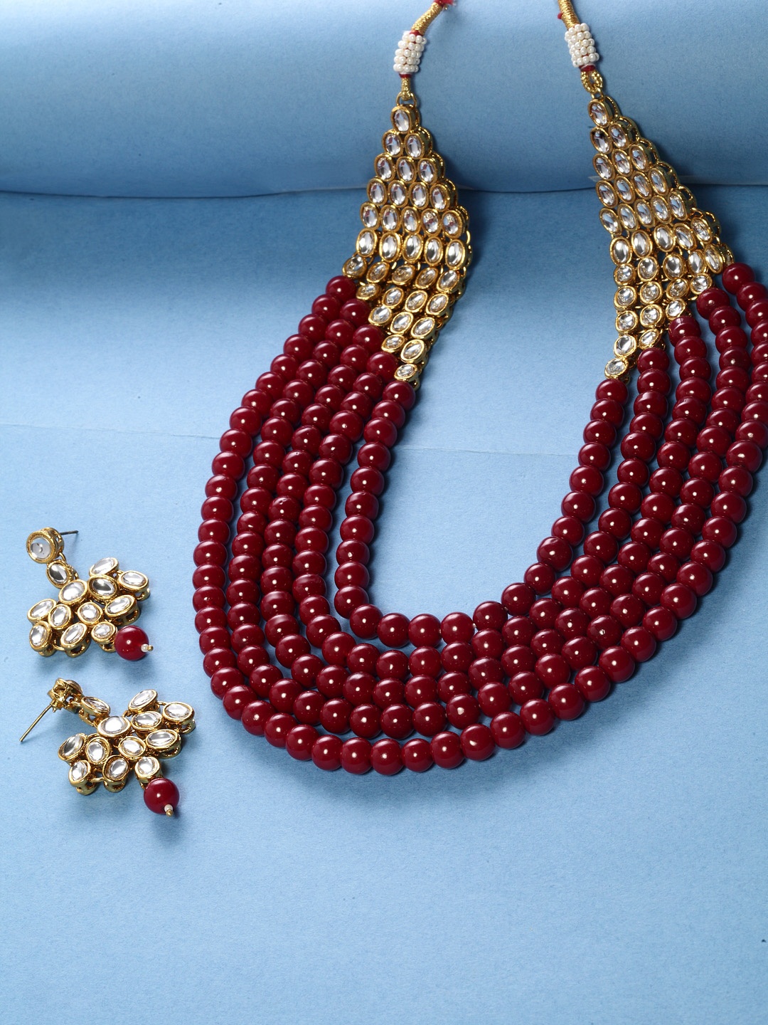 

Shining Diva Women Gold-Plated & Red Beaded Kundan Jewellery Set