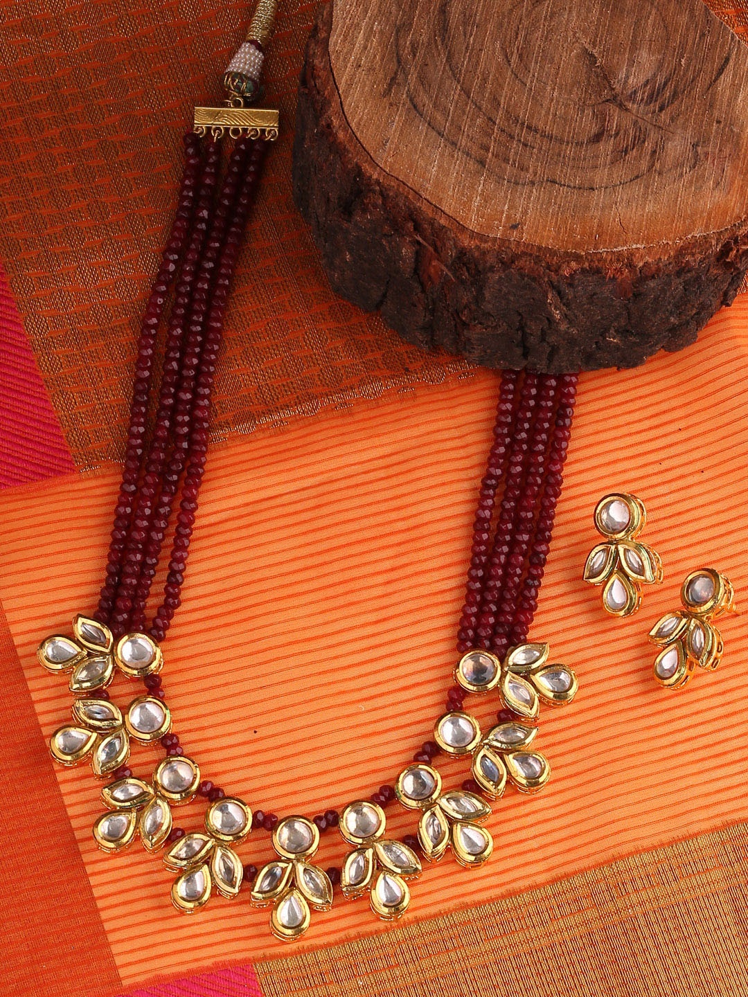 Shoshaa Women Gold-Plated & Red Kundan Embellished Jewellery Set