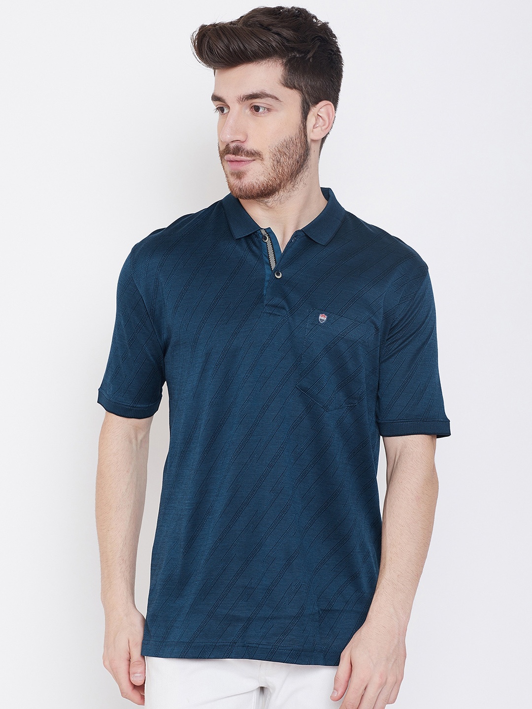 

Duke Men Blue Self Design Polo Collar T-shirt