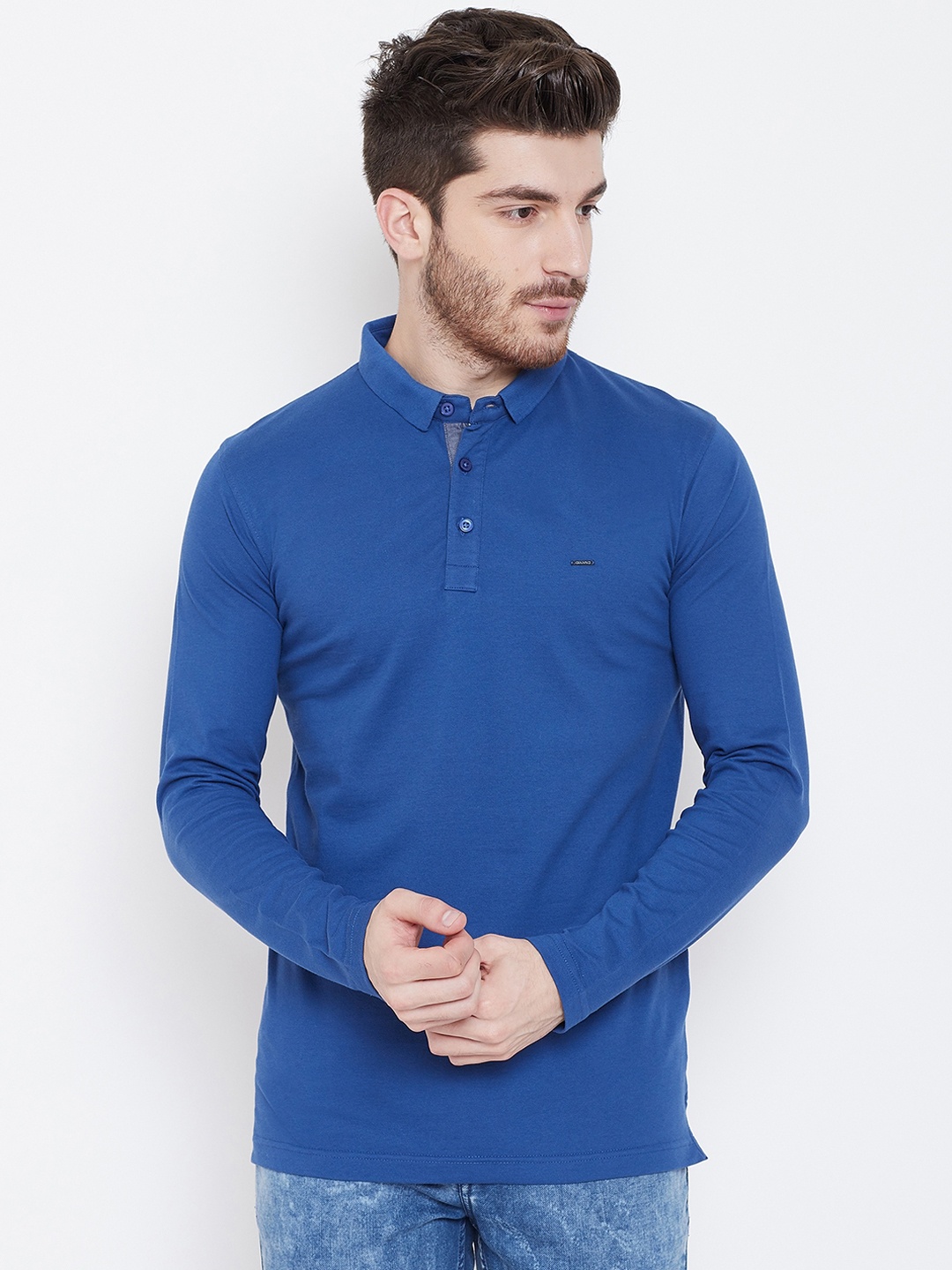 

Okane Men Blue Solid Polo Collar T-shirt