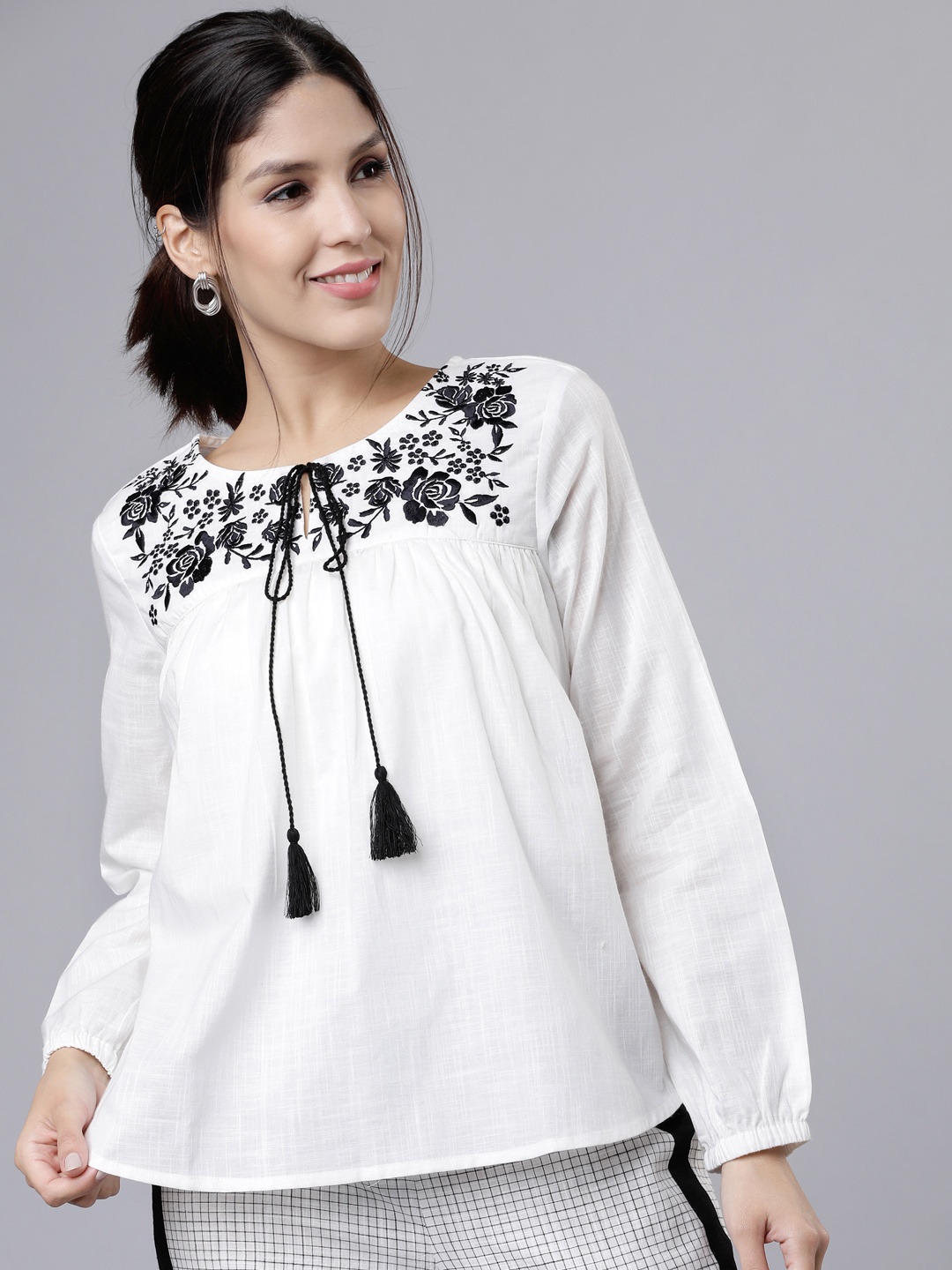 

Vishudh Women Off-White Floral Embriodered A-Line Pure Cotton Top