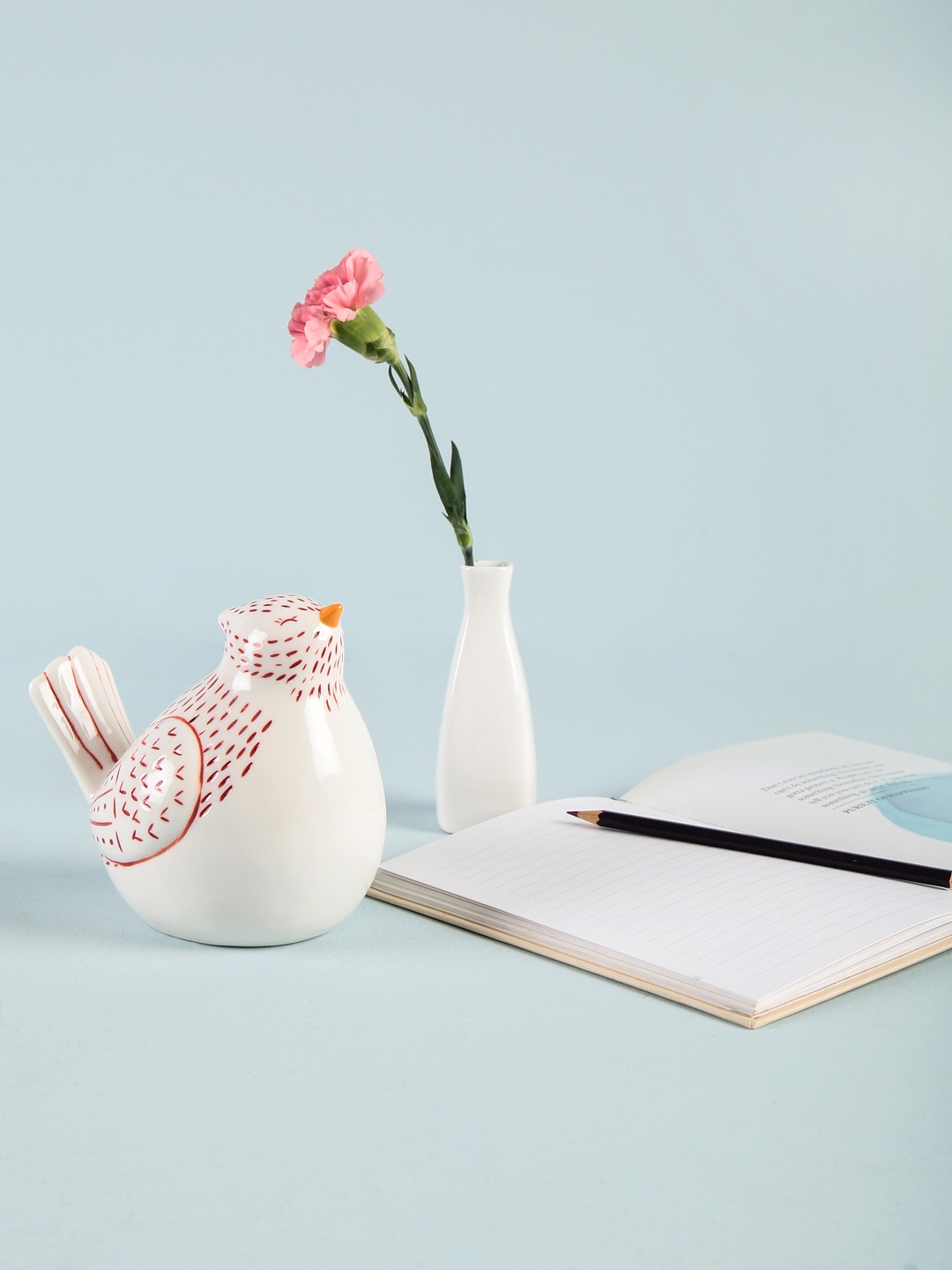 

Chumbak White and Red Porcelain Chirping Bird Showpiece