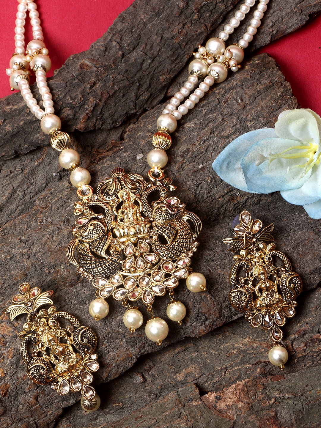 

ANIKAS CREATION Women Gold-Plated Black & Gold Stone Studded Pearl Temple Jewellery Set