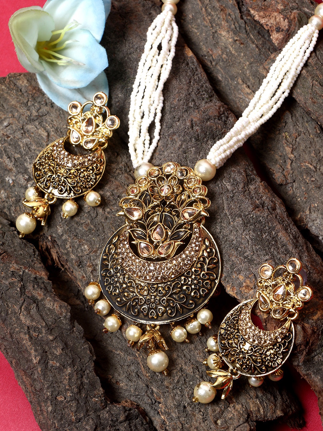 

ANIKAS CREATION Women Gold-Plated Black Stone Studded Pearl Temple Jewellery Set