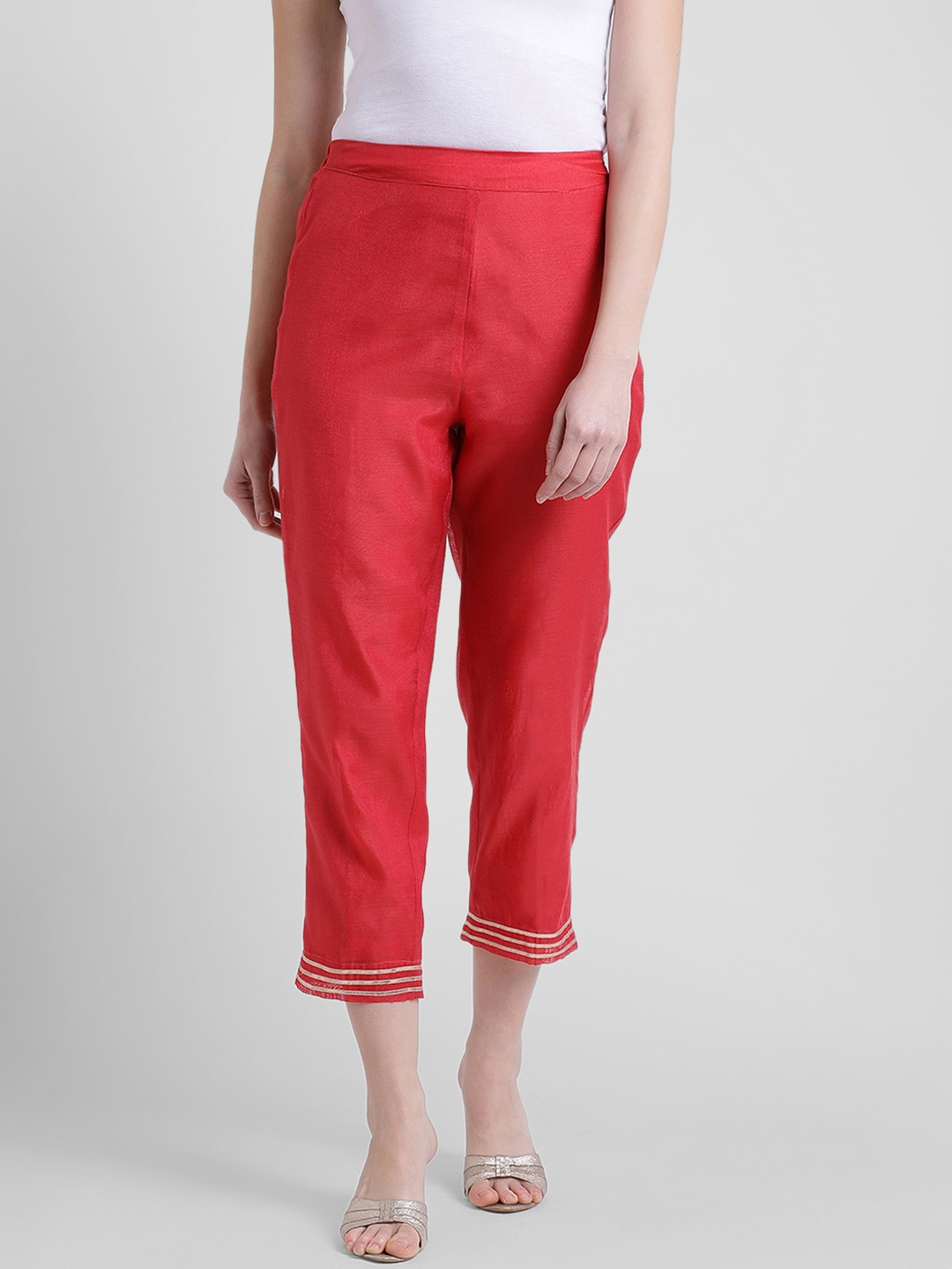 

Aayna Women Red Comfort Tapered Fit Solid Cigarette Trousers