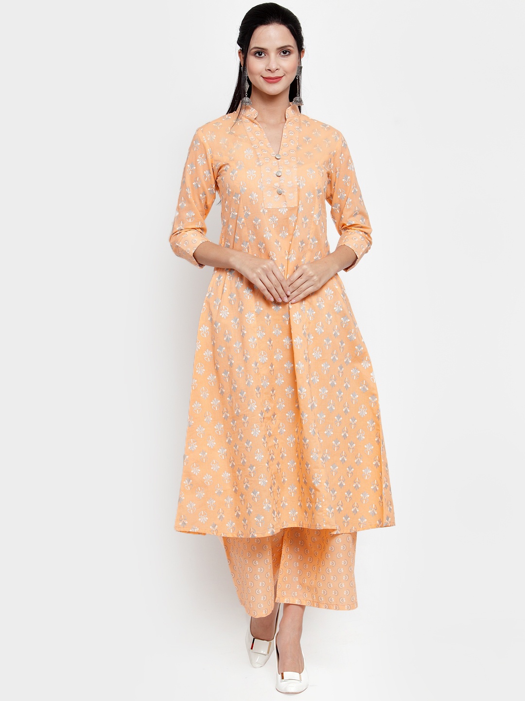 

Get Glamr Women Orange & White Printed Kurti with Palazzos