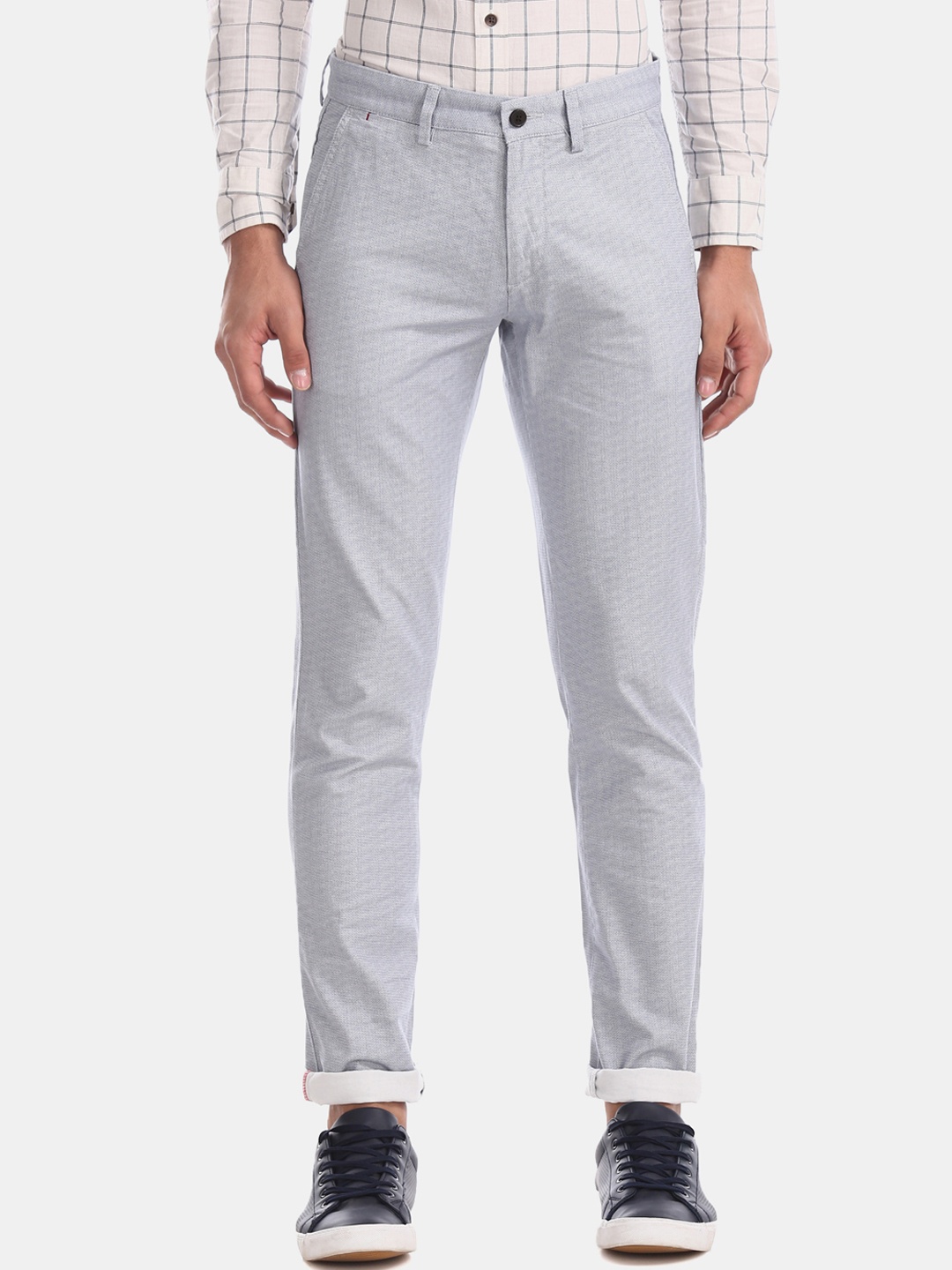 

Arrow Sport Men Blue Self Design Regular Fit Trousers