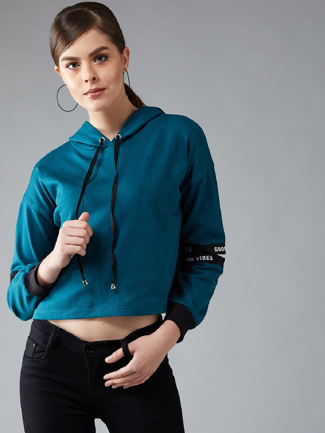 

DOLCE CRUDO Women Teal Blue Solid Hooded Sweatshirt