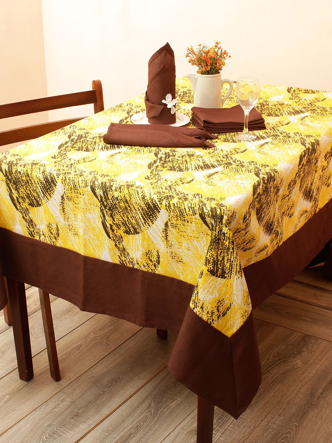 

Soumya Yellow & Brown Printed Table Cover With Set of 6 Napkins