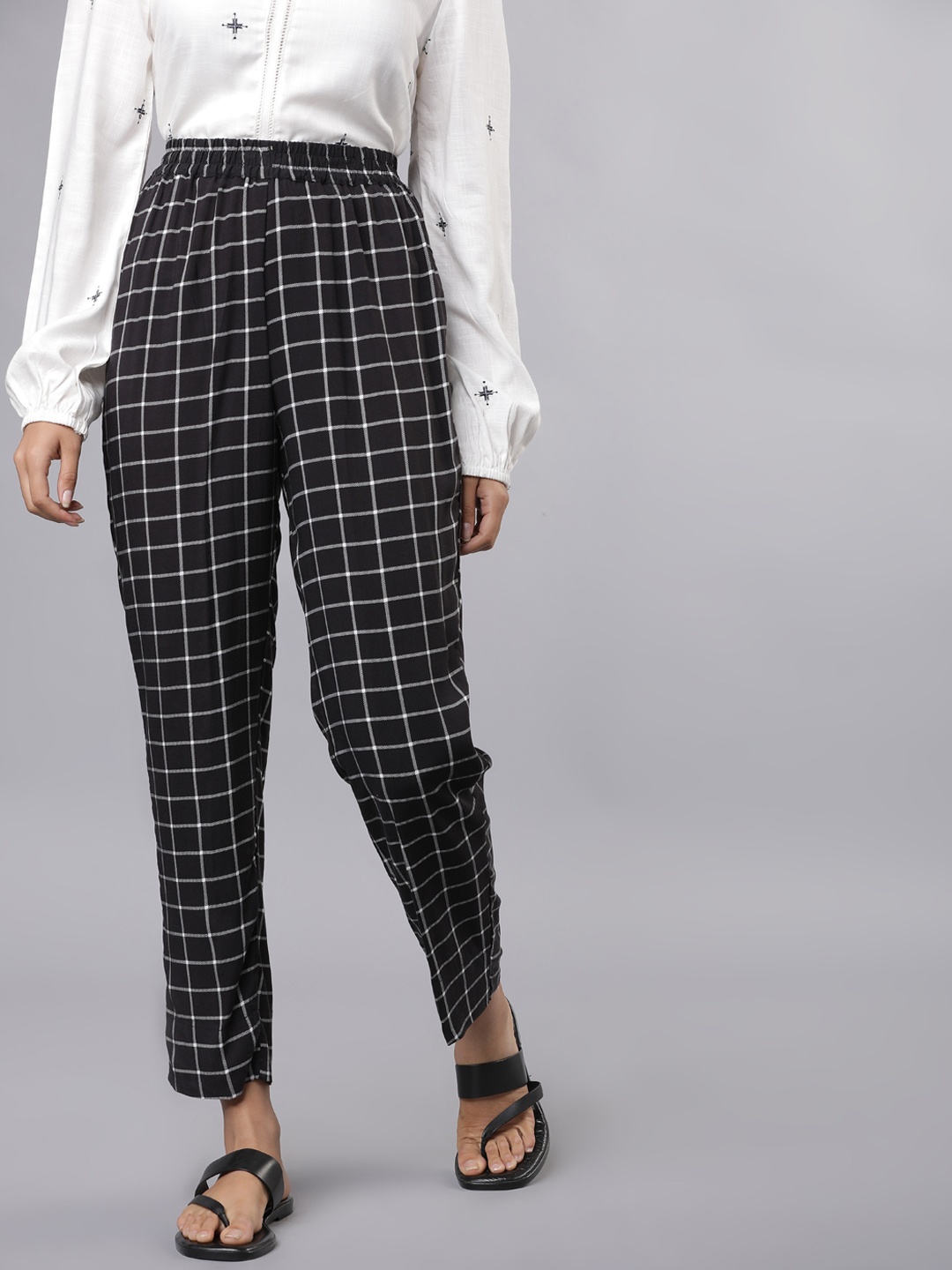 

Vishudh Women Black & White Slim Fit Checked Regular Trousers