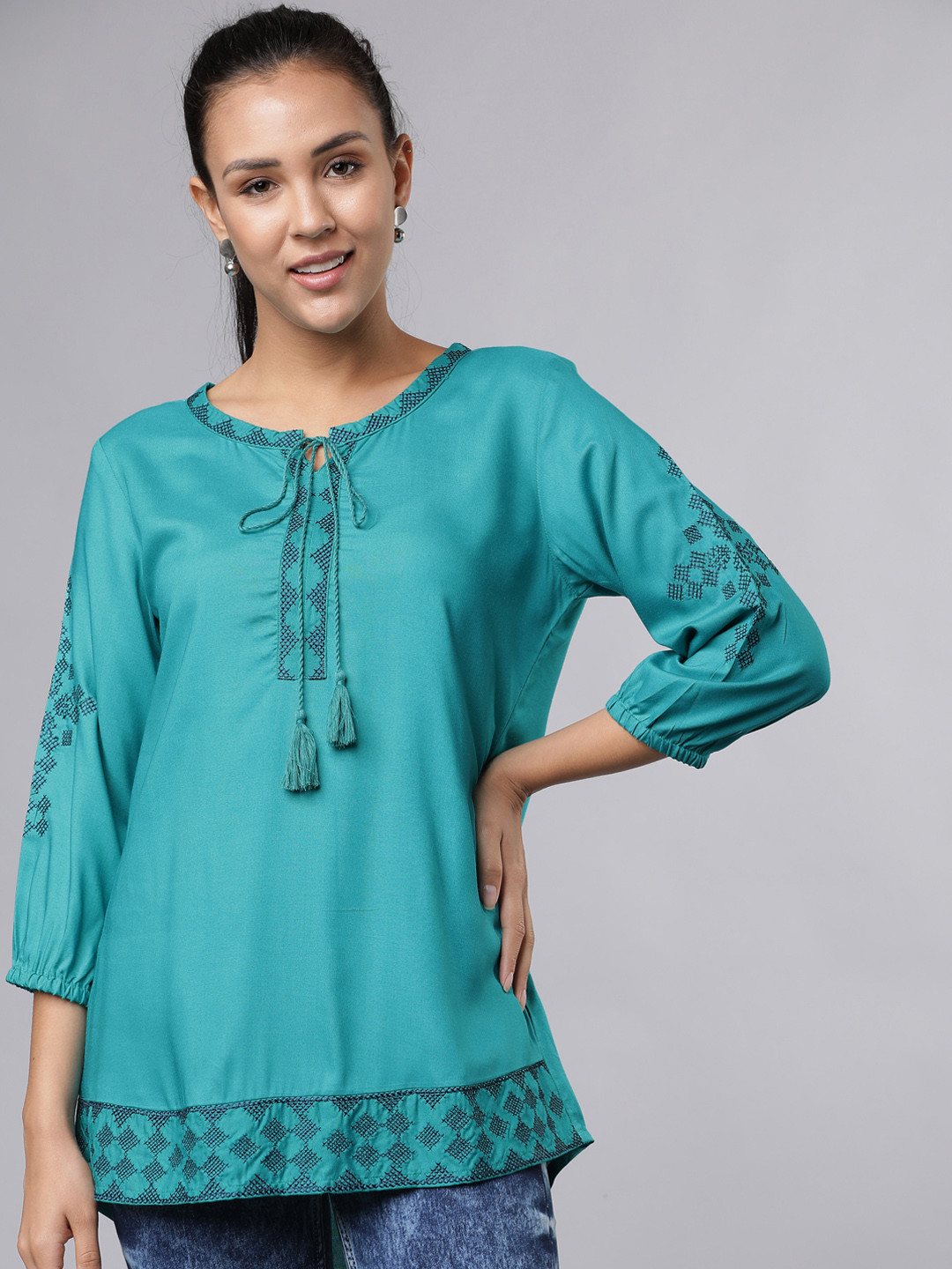 

Vishudh Women Turquoise Blue Embroidered High-Low Top