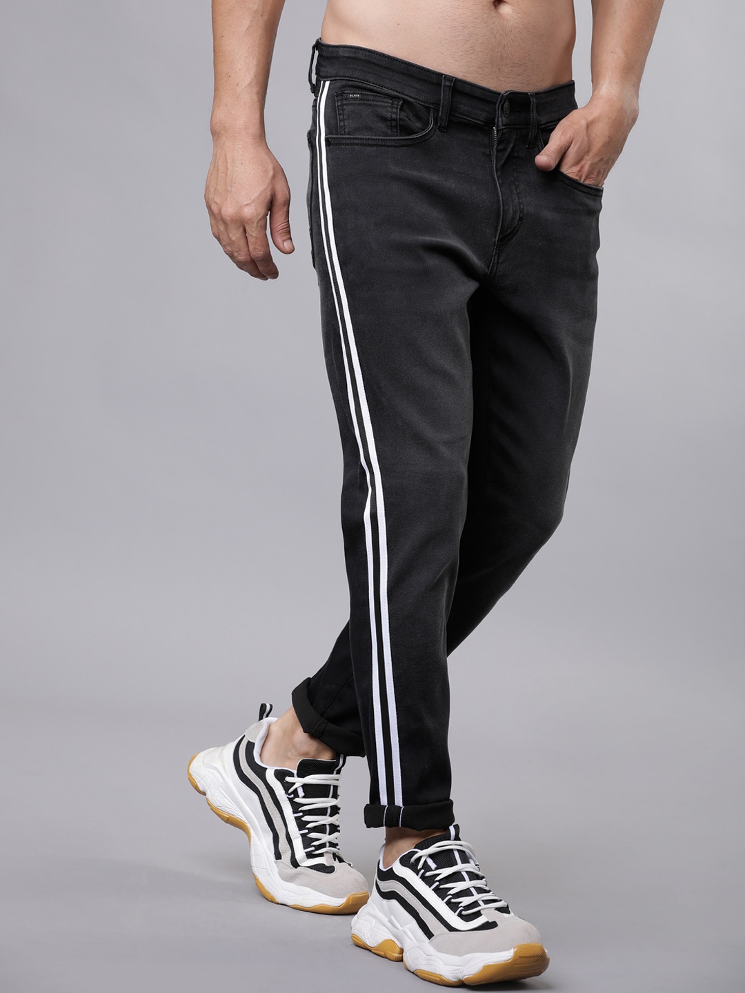 

HIGHLANDER Men Black Tapered Fit Mid-Rise Clean Look Stretchable Jeans