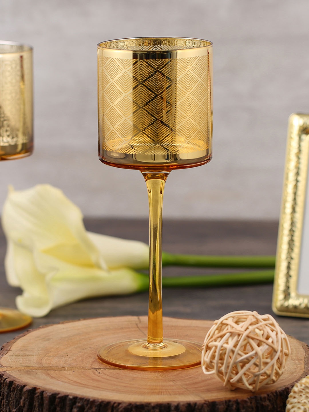

Pure Home and Living Gold-Toned Patterned Candle Holder with Stem