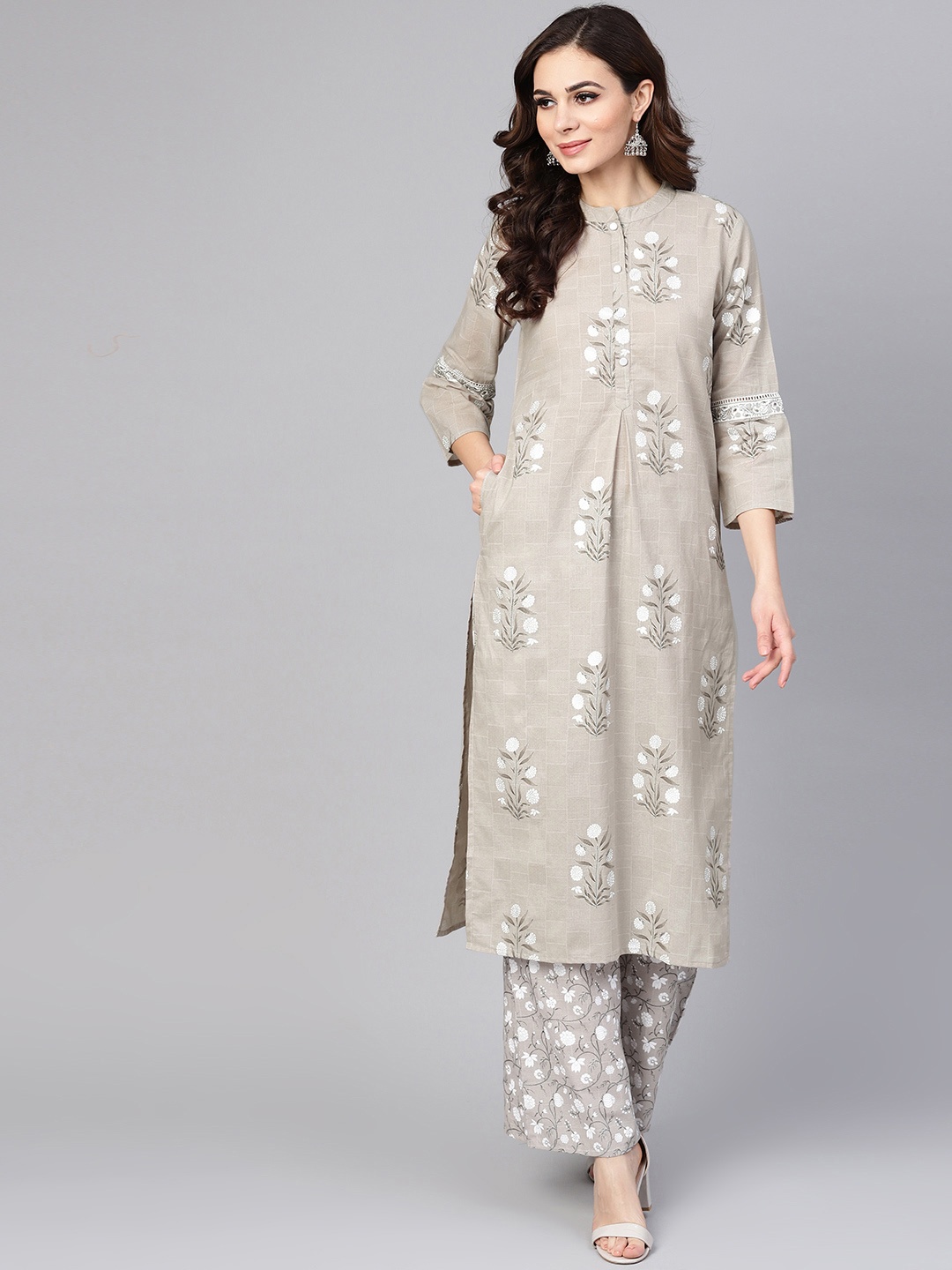 

Yuris Women Grey & White Printed Kurta with Palazzos