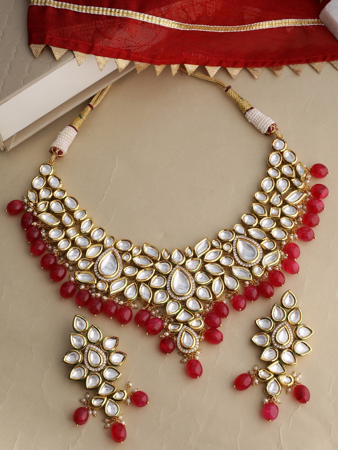 

Tistabene Gold-Plated Red & White Stone Studded Jewellery Set