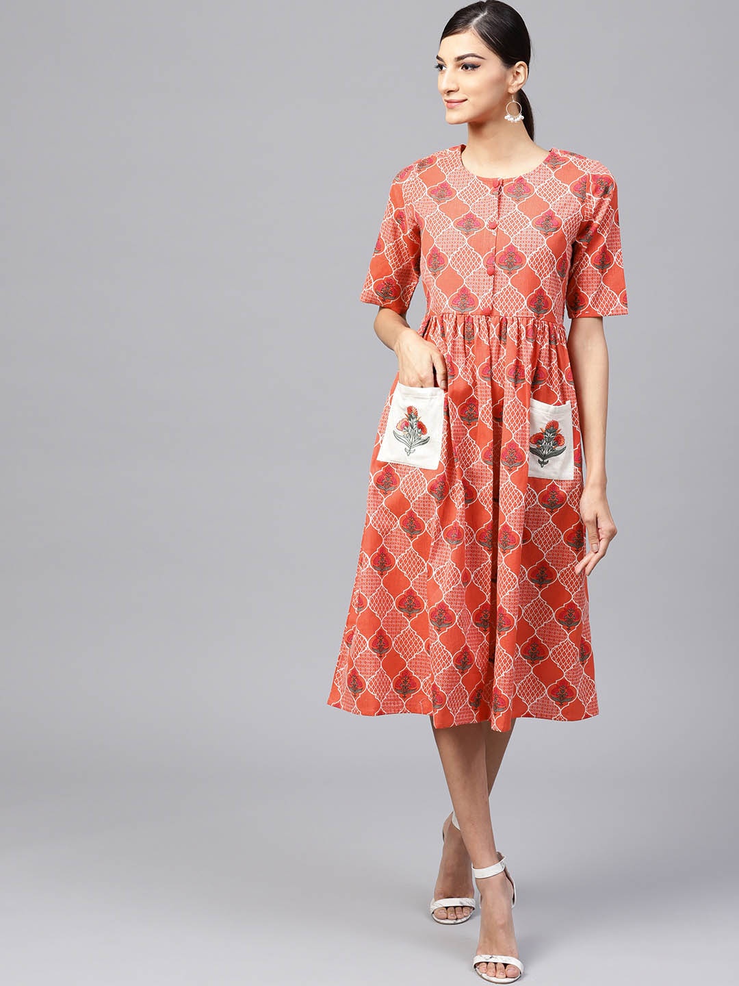 

Indo Era Women Coral Orange Printed Fit and Flare Dress