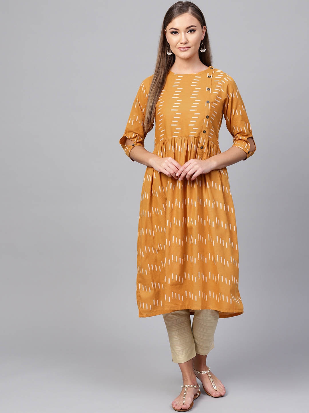 

Indo Era Women Mustard Yellow & Off-White Printed A-Line Kurta