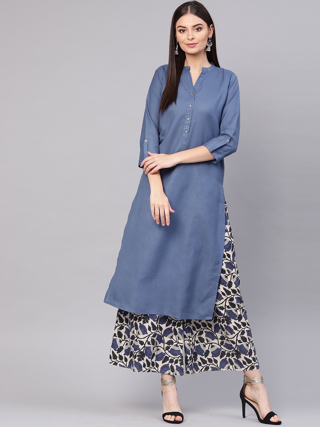 

Indo Era Women Blue Solid Straight Kurta