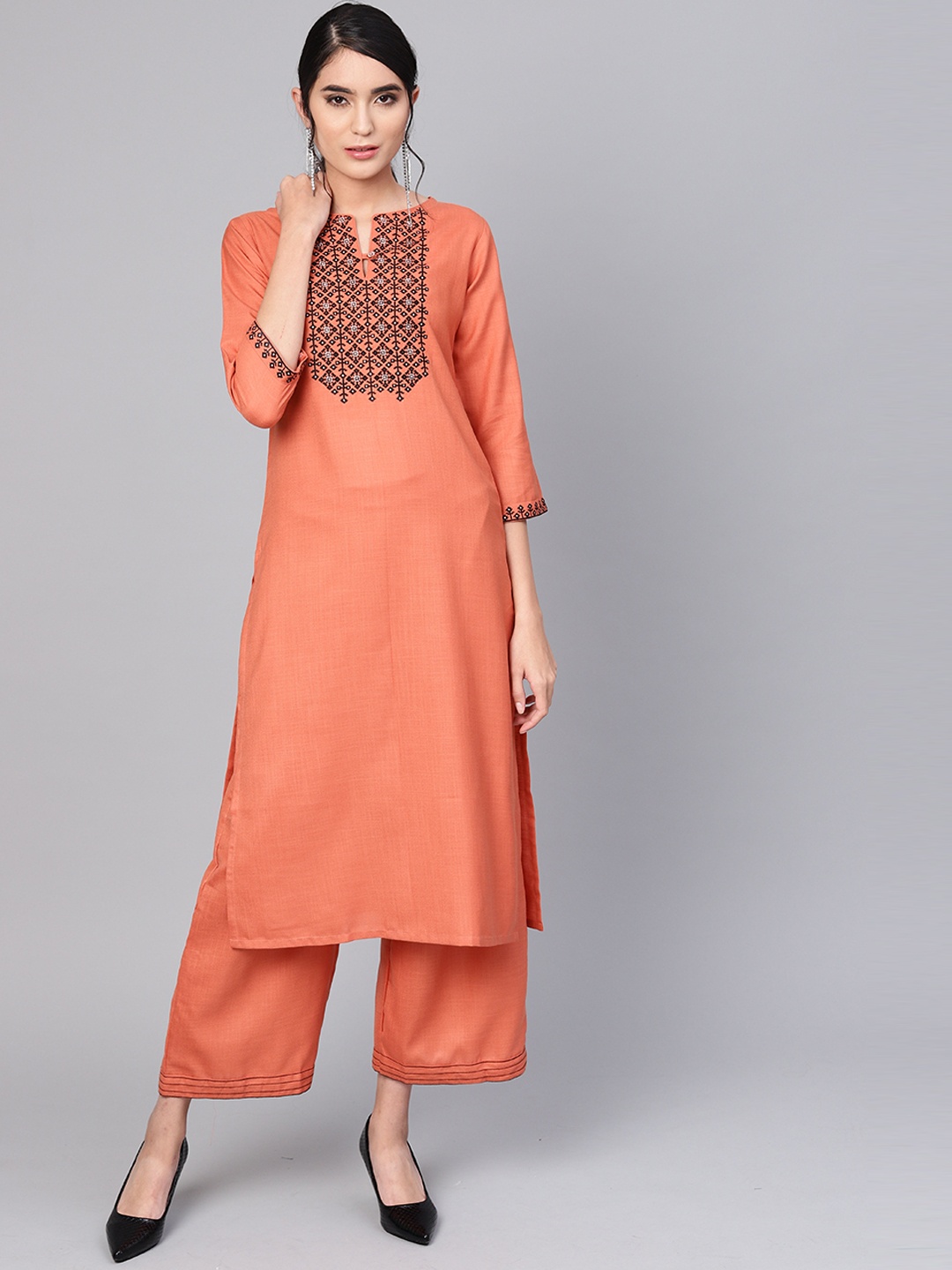 

Indo Era Women Rust Orange Yoke Design Straight Kurta