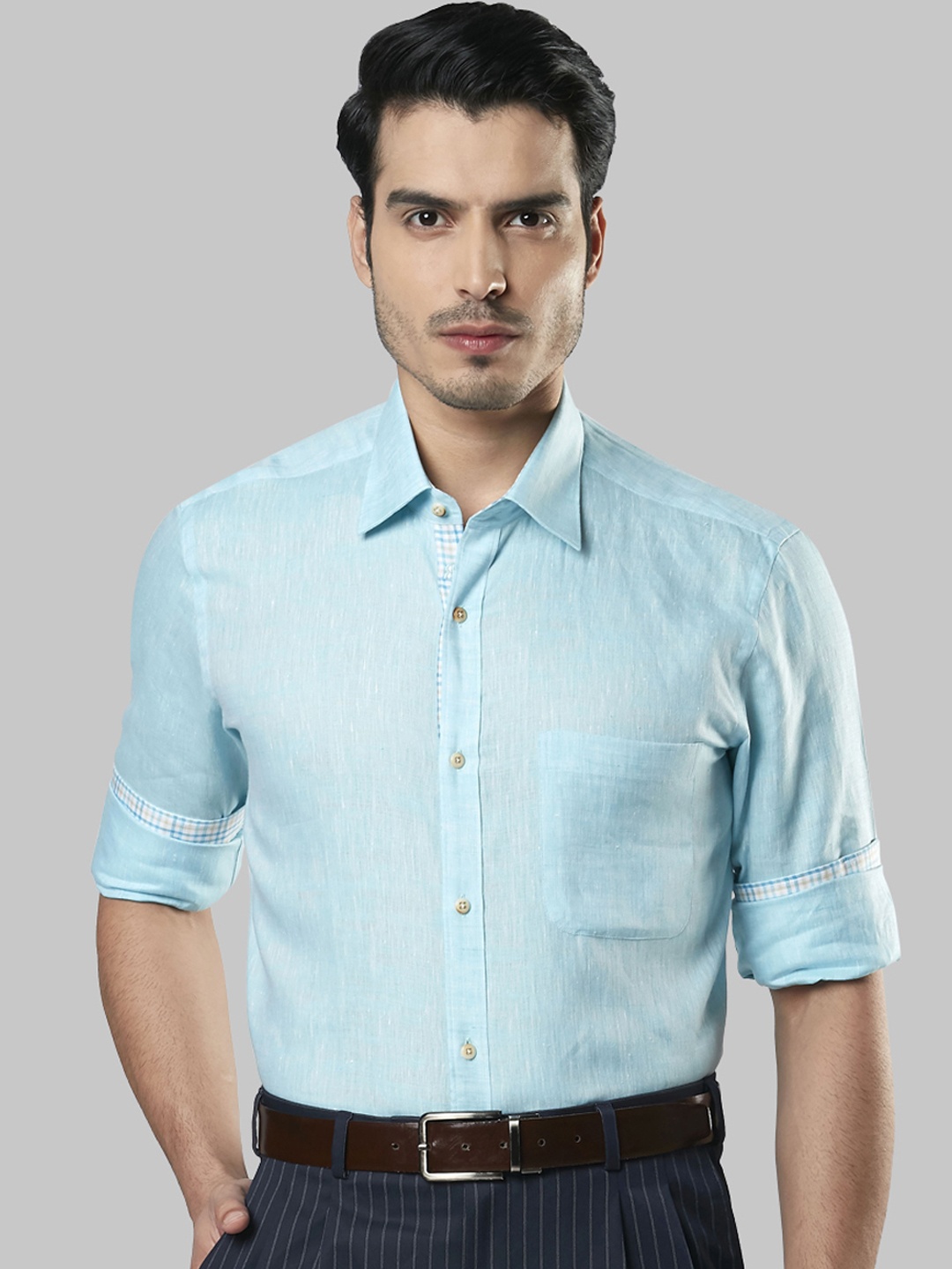 

Raymond Men Turquoise Blue Regular Fit Solid Formal Shirt