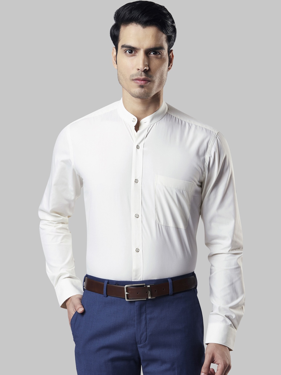 

Raymond Men Beige Regular Fit Solid Formal Shirt