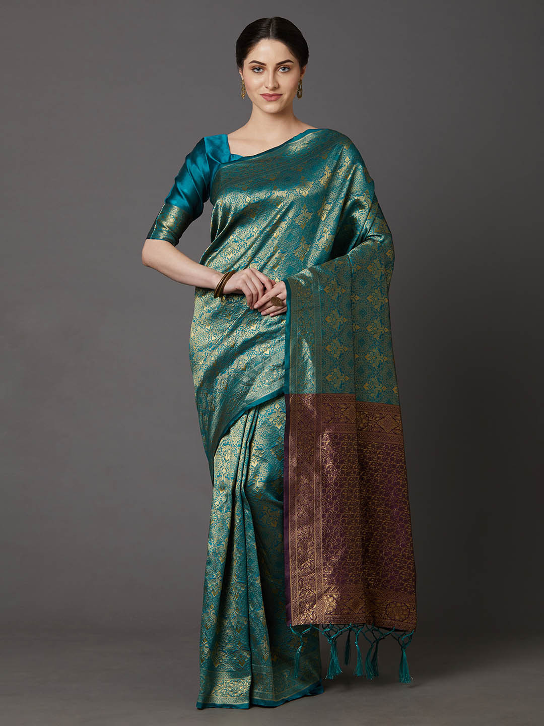 

Mitera Teal & Blue Silk Blend Woven Design Banarasi Saree