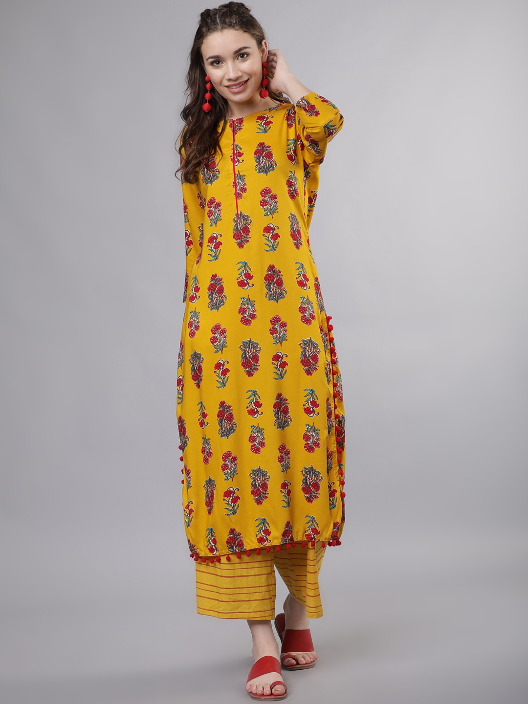 

Vishudh Women Mustard Yellow Printed Kurta with Palazzos