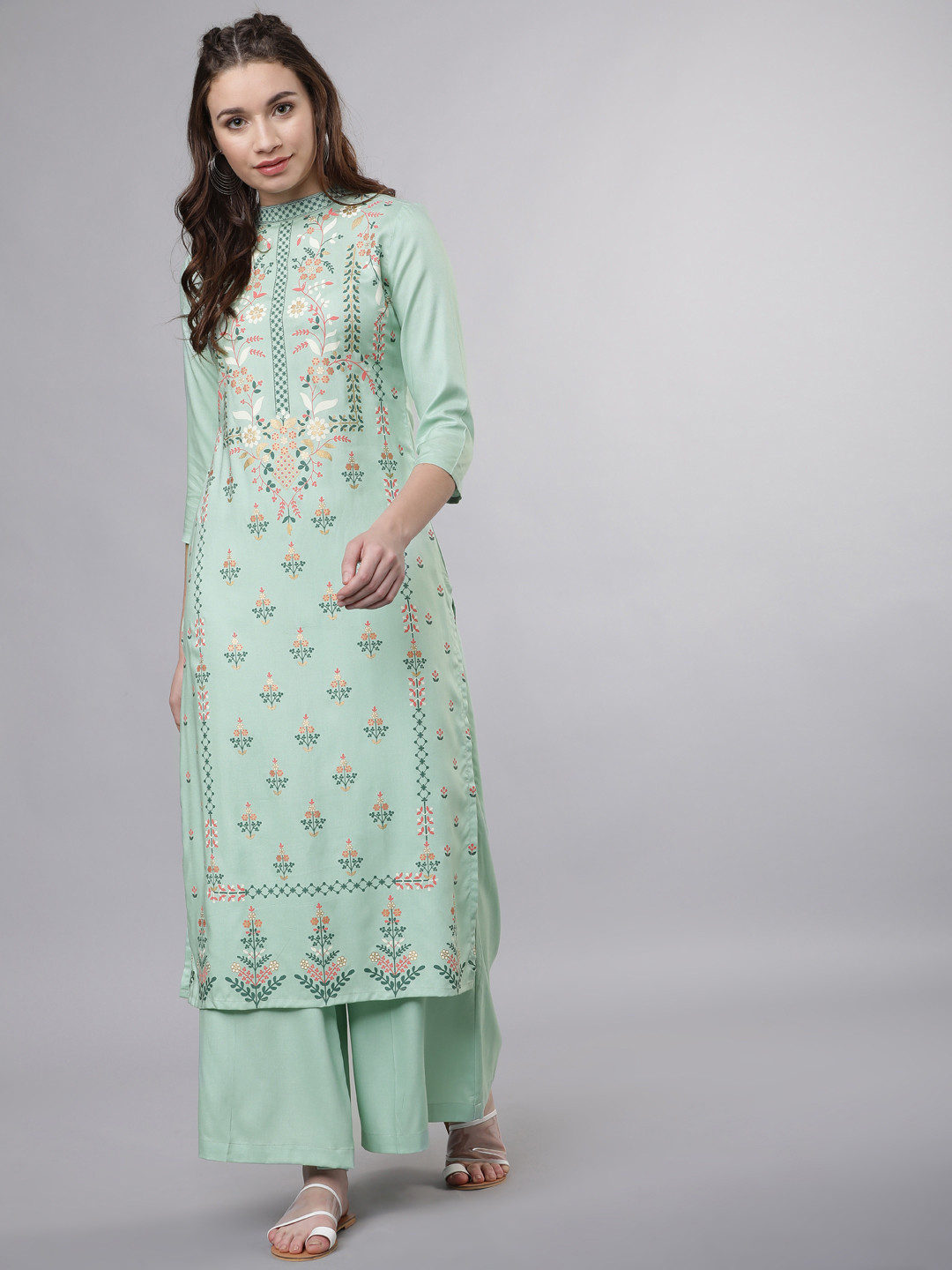 

Vishudh Women Sea Green Printed Kurta with Palazzos