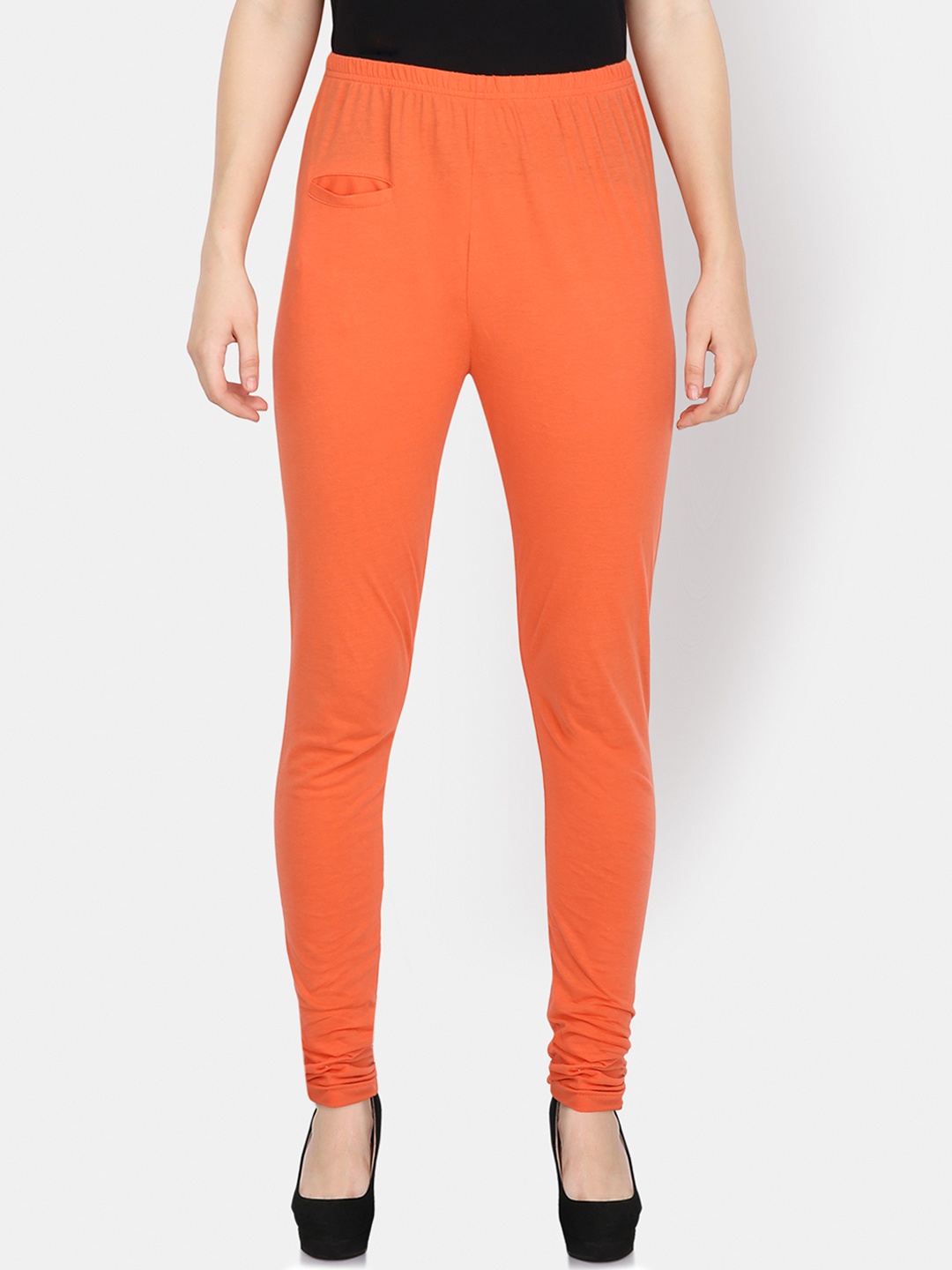 Yaadleen Women Orange Solid Churidar-Length Leggings
