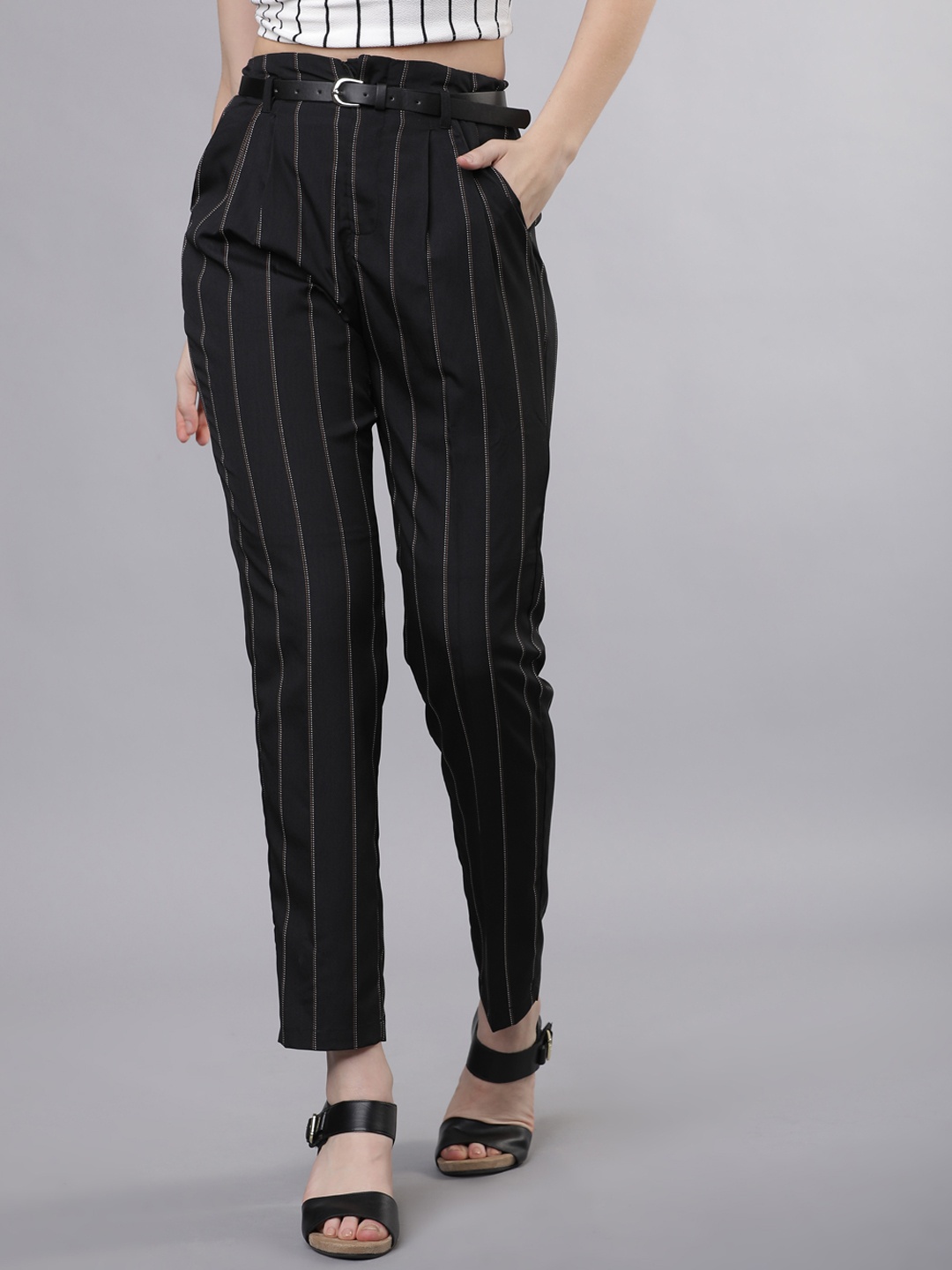 

Tokyo Talkies Women Black & Off-White Regular Fit Printed Regular Trousers