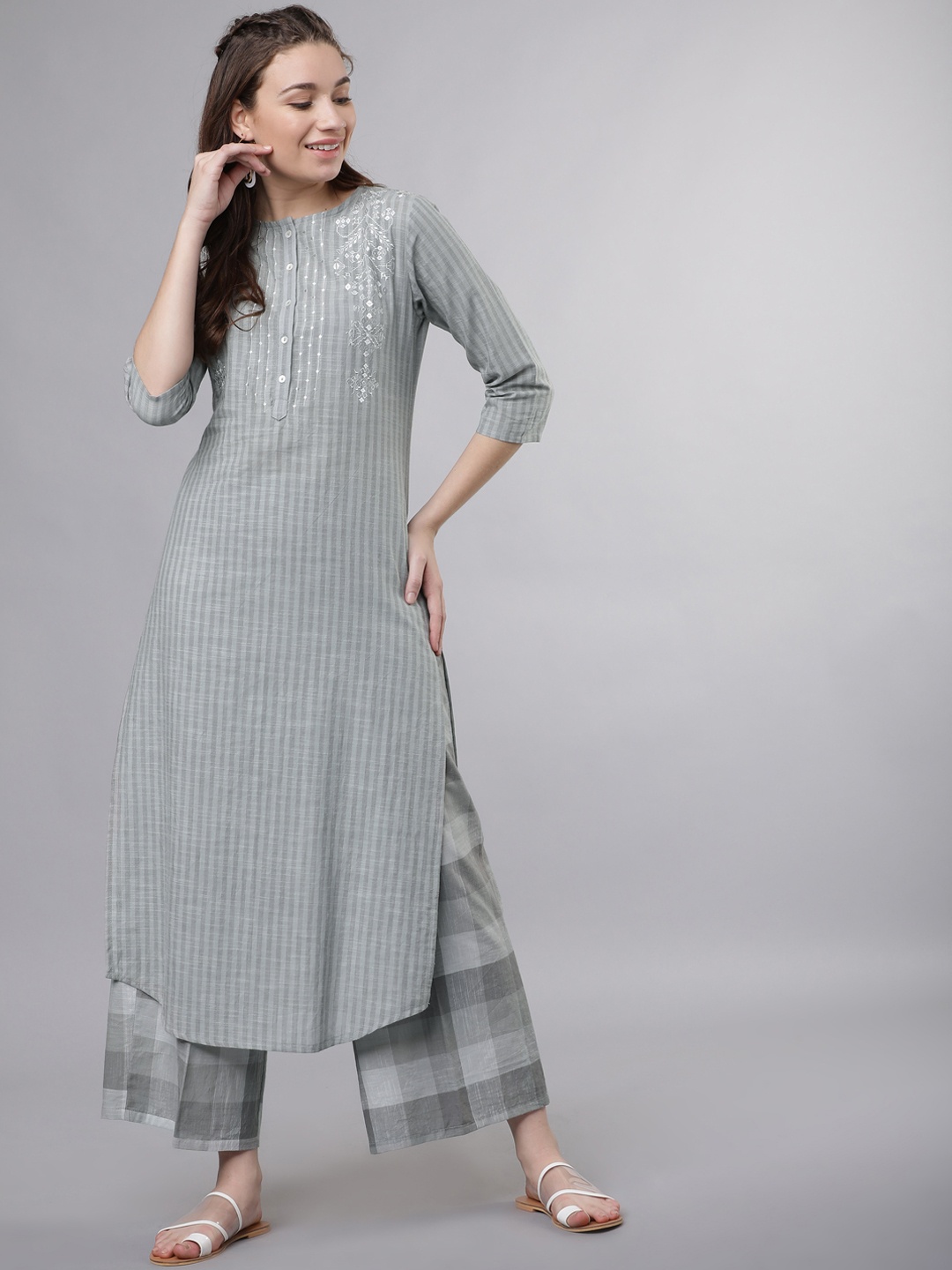 

Vishudh Women Grey Striped Kurta with Palazzos