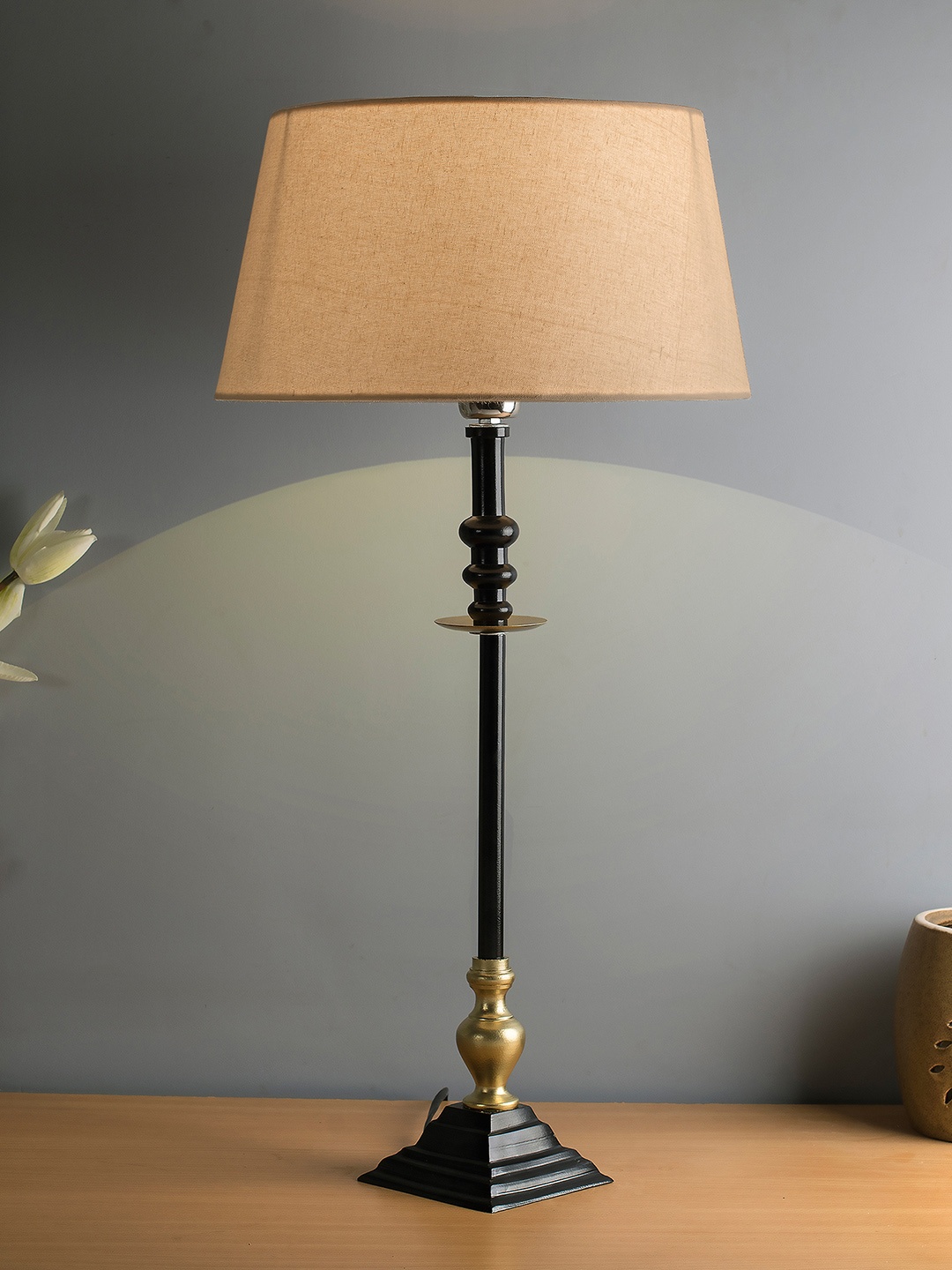 

Homesake Beige & Black Solid Contemporary Riveria Table Lamp