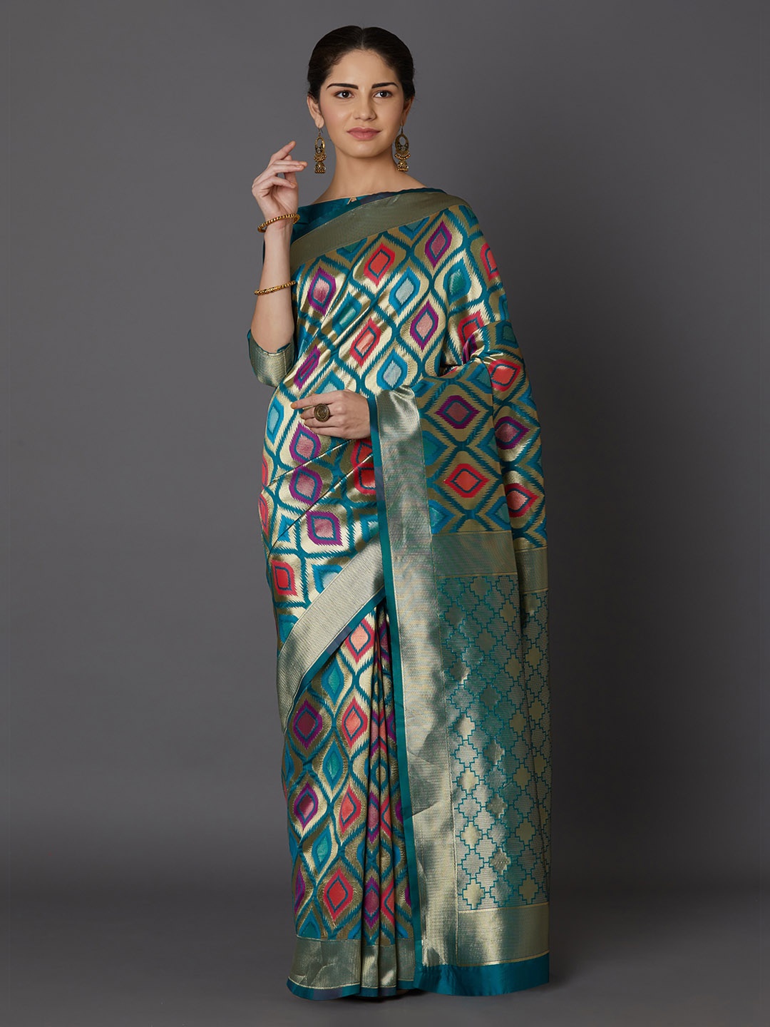 

Mitera Green & Purple Silk Blend Woven Design Kanjeevaram Saree