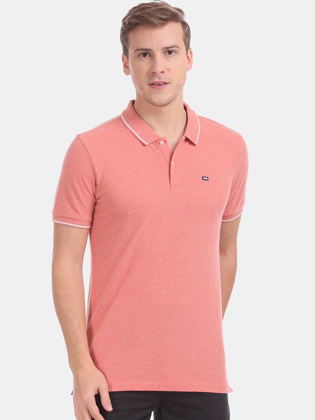 

Arrow Sport Men Coral Pink Solid Polo Collar T-shirt
