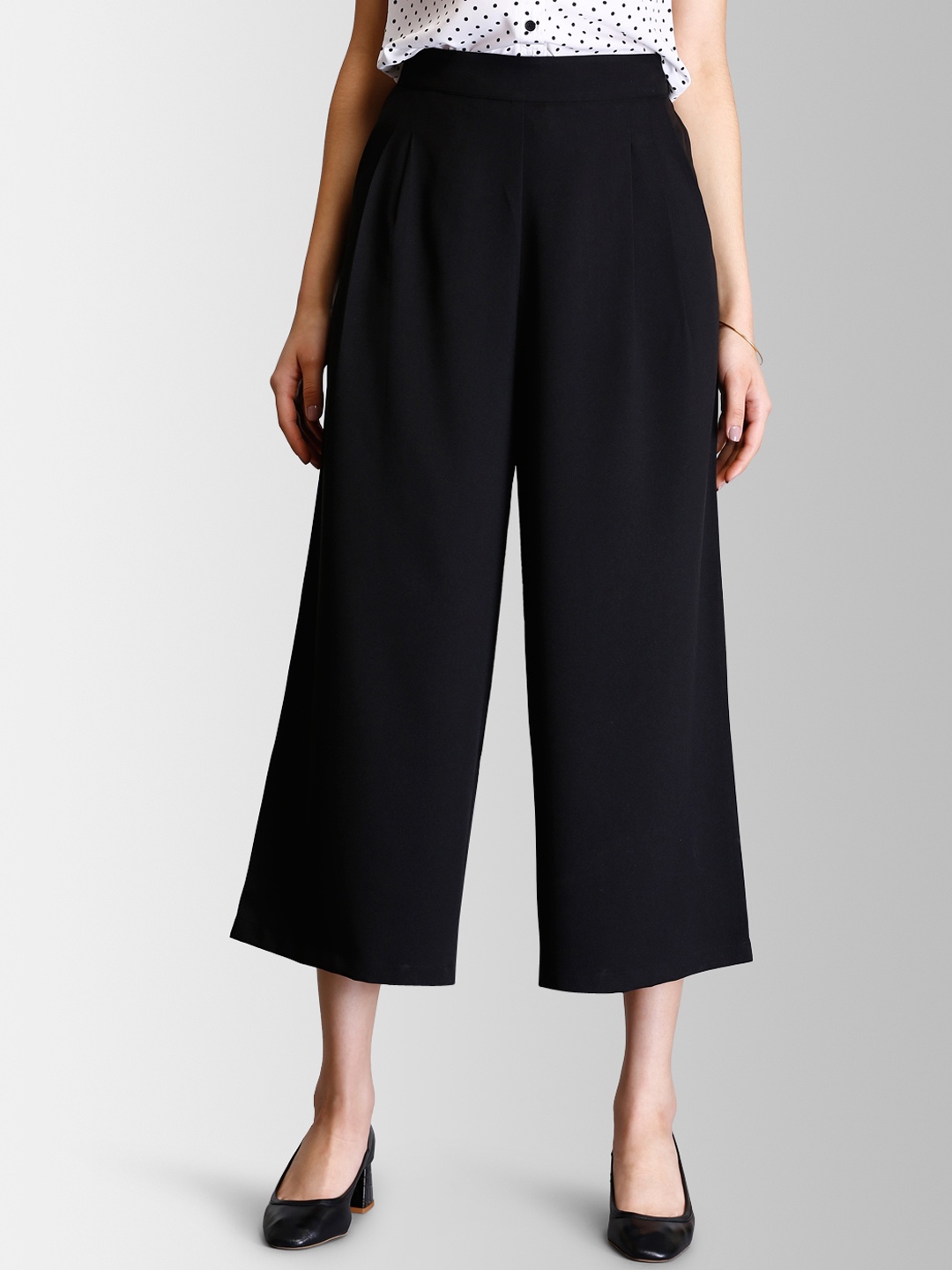 

FableStreet Women Black Flared Solid Parallel Trousers