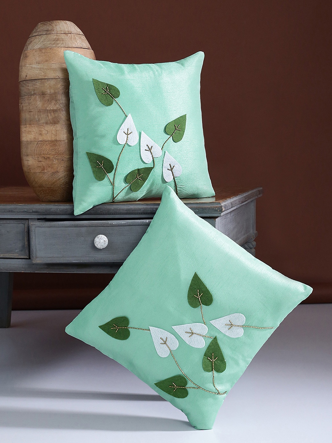 

Alina decor Set of 2 Sea Green Self Design Square Cushion Covers