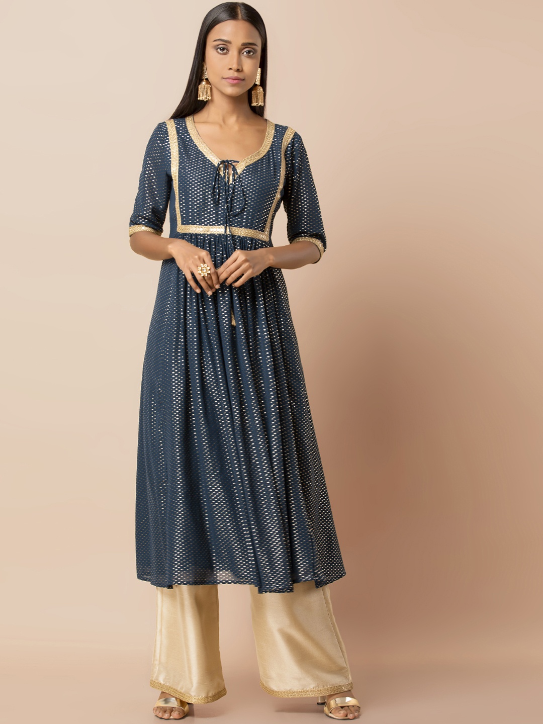 

INDYA Women Teal Blue Embellished A-Line Kurta with Foil Print