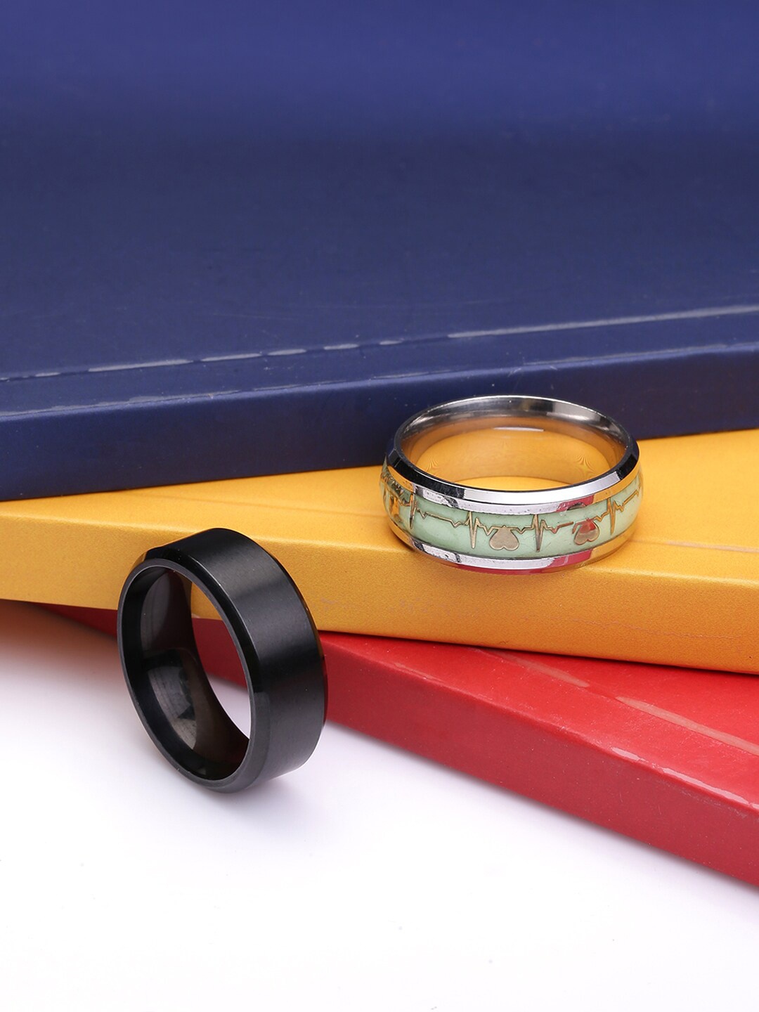 

Yellow Chimes Men Set Of 2 Silver Toned & Black Finger Rings