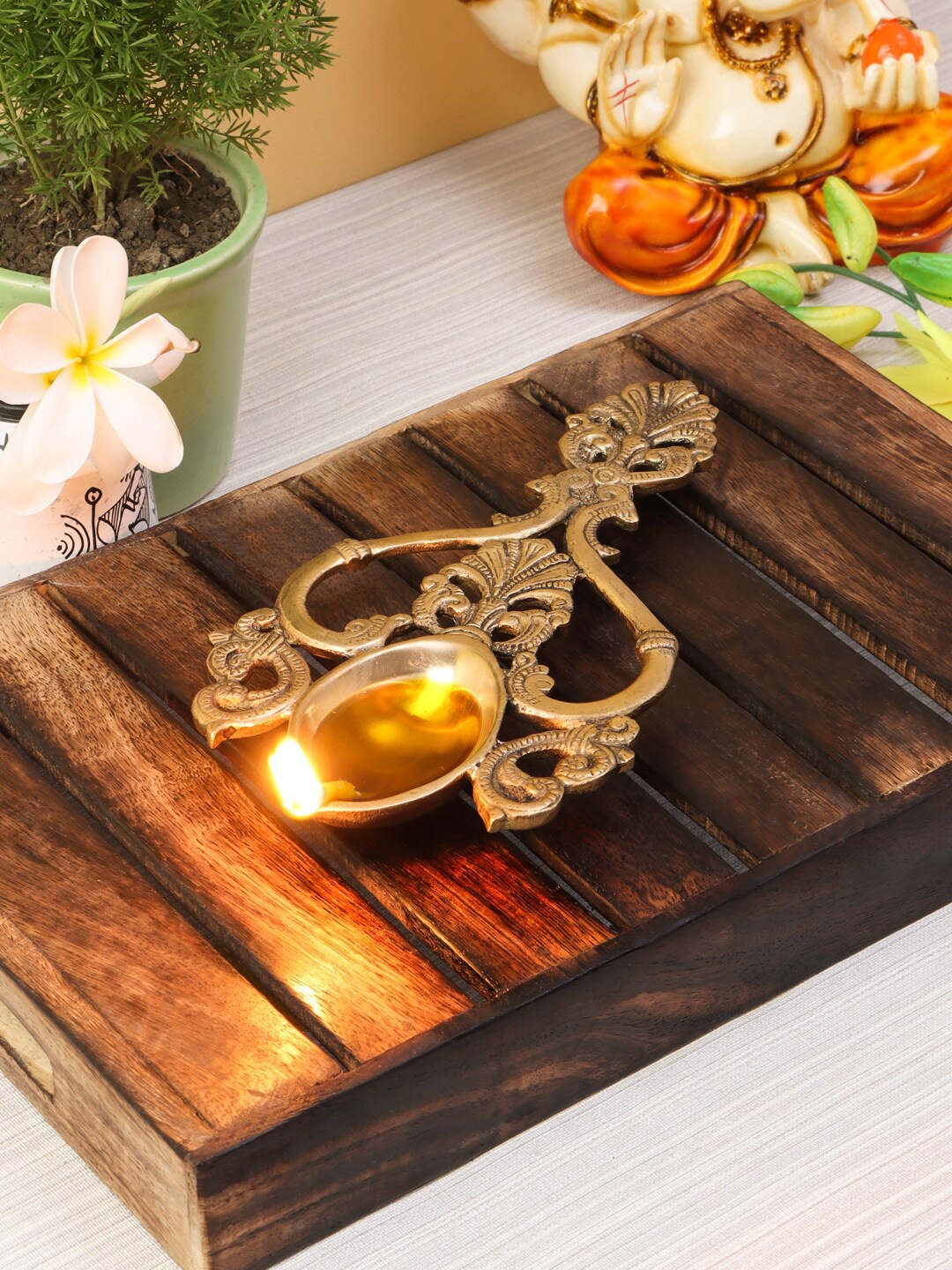 

Imli Street Gold-Toned Festive Ritual Spoon Shaped Diya