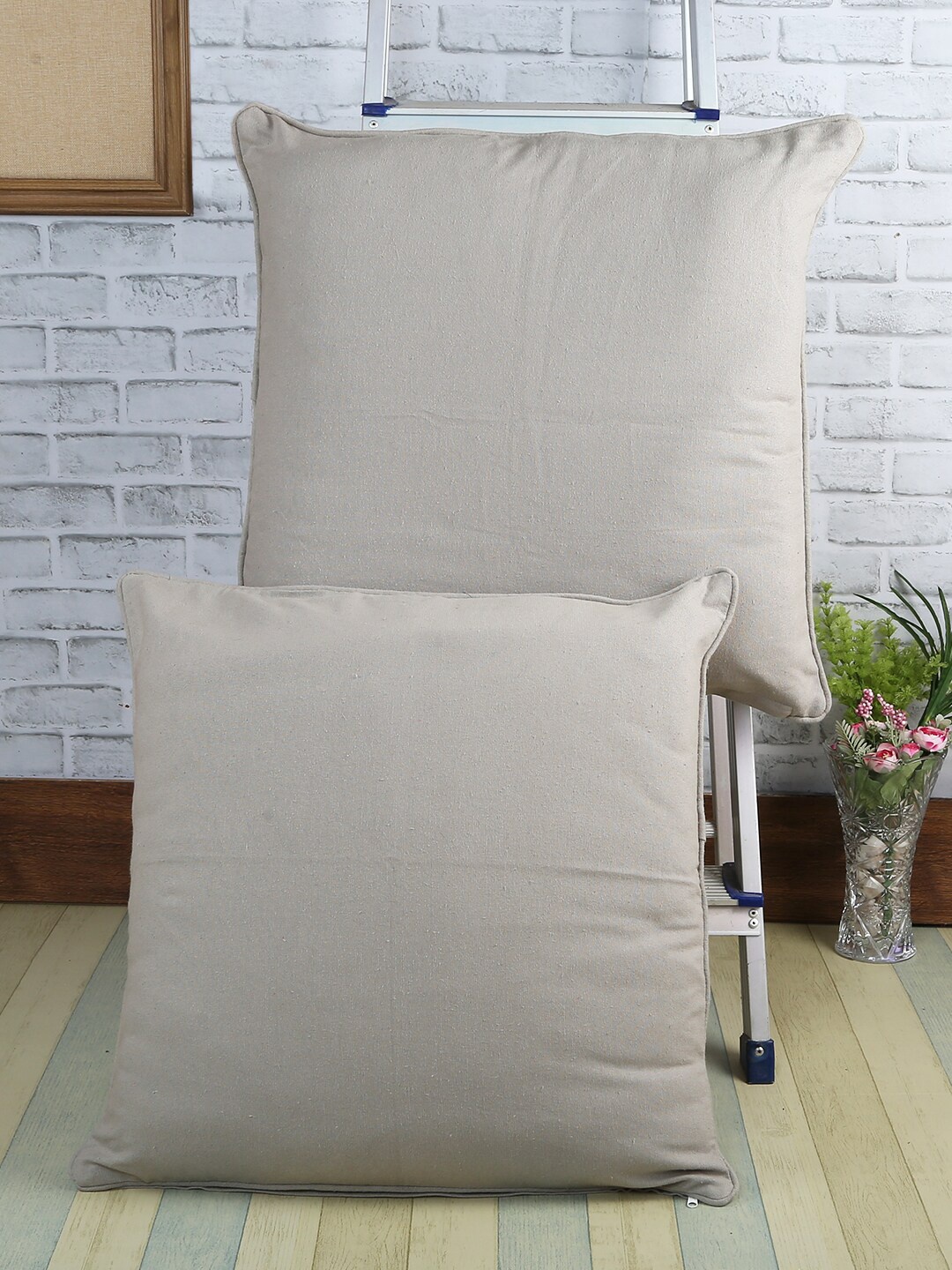

Soumya Grey Set of 2 Self Design Square Cushion Covers