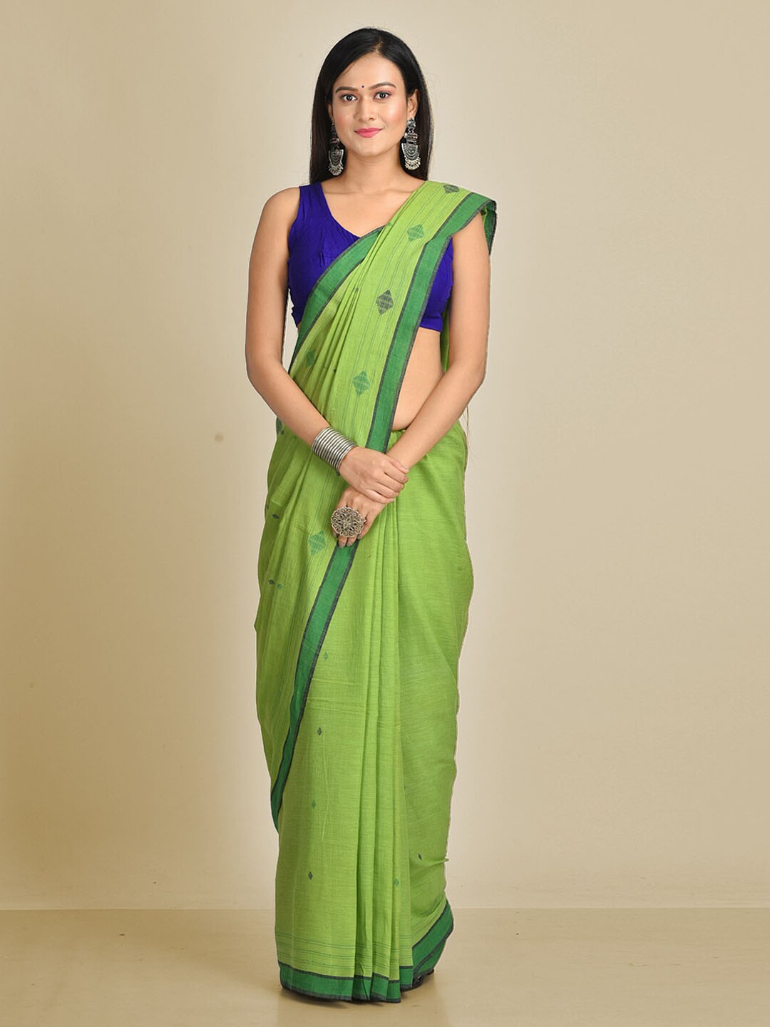 

Mitera Green Pure Cotton Woven Design Taant Saree