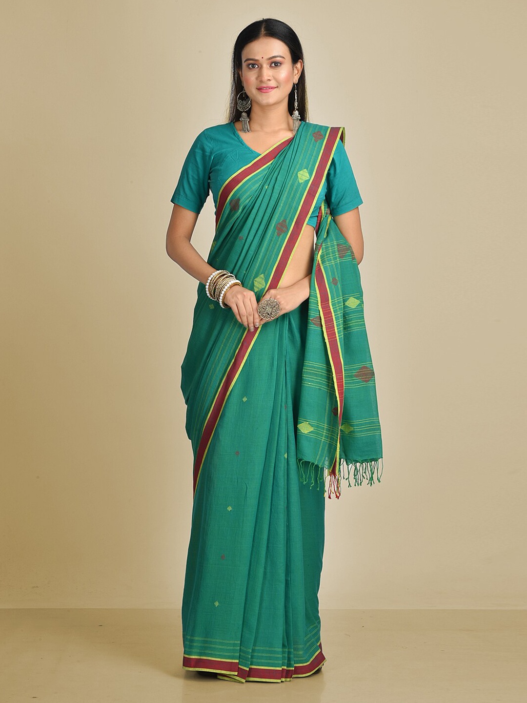 

Mitera Green Pure Cotton Woven Design Taant Handloom Saree