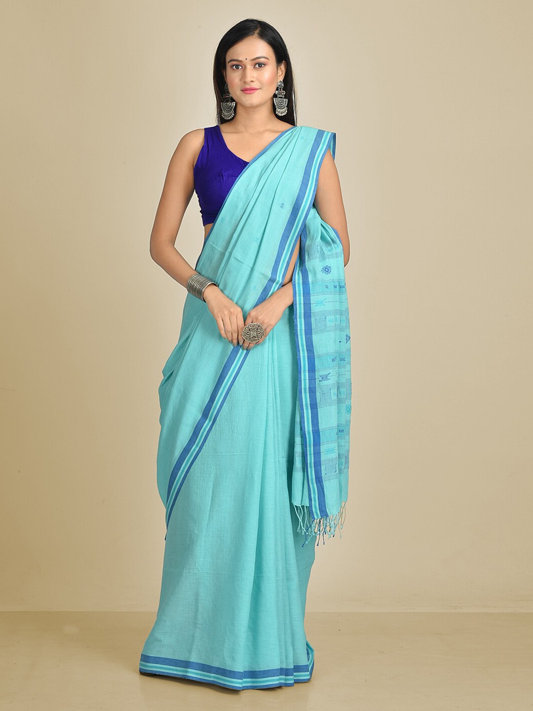

Mitera Turquoise Blue Pure Cotton Woven Design Taant Handloom Saree