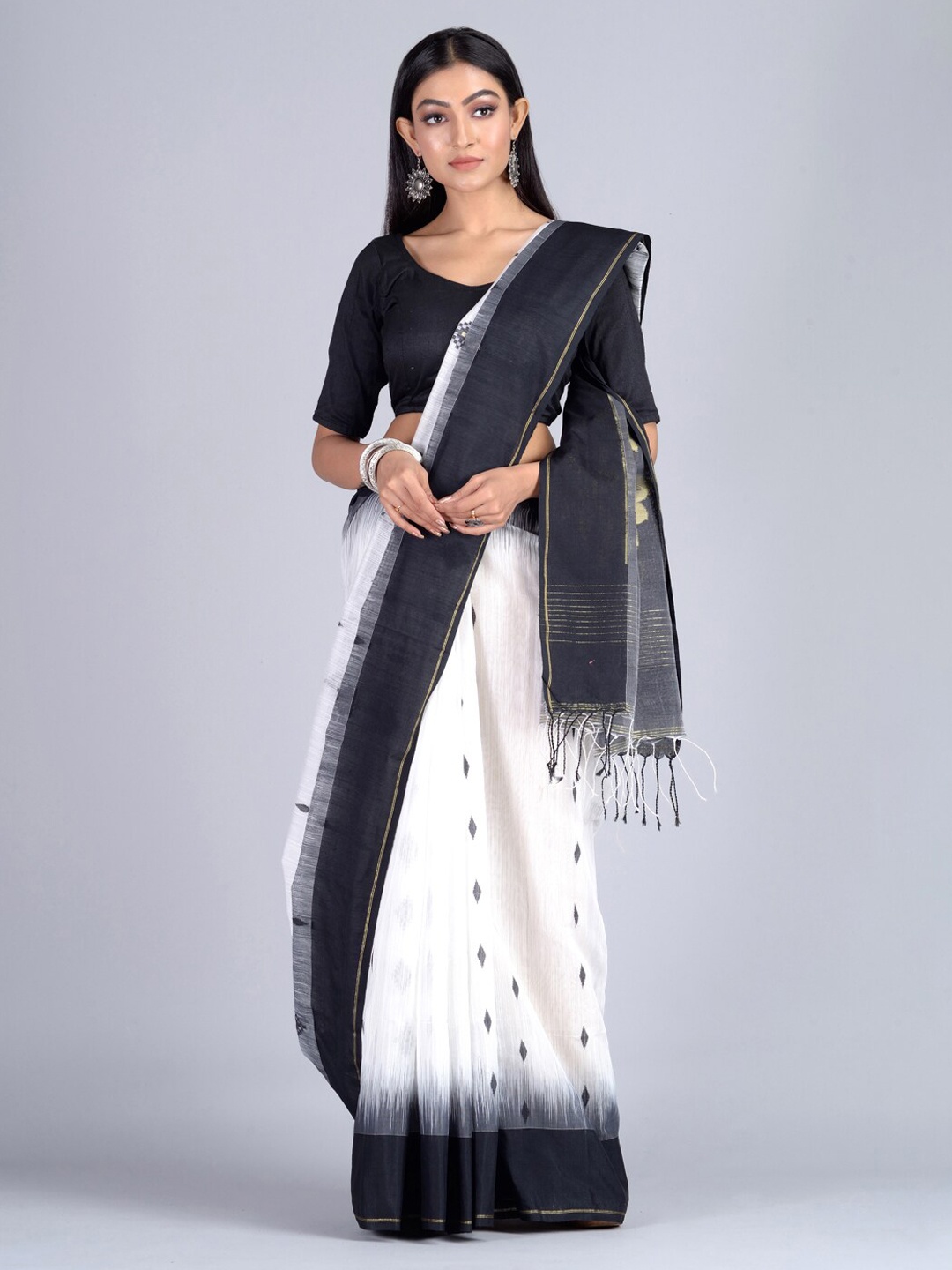 

Mitera White & Black Silk Cotton Woven Design Taant Saree