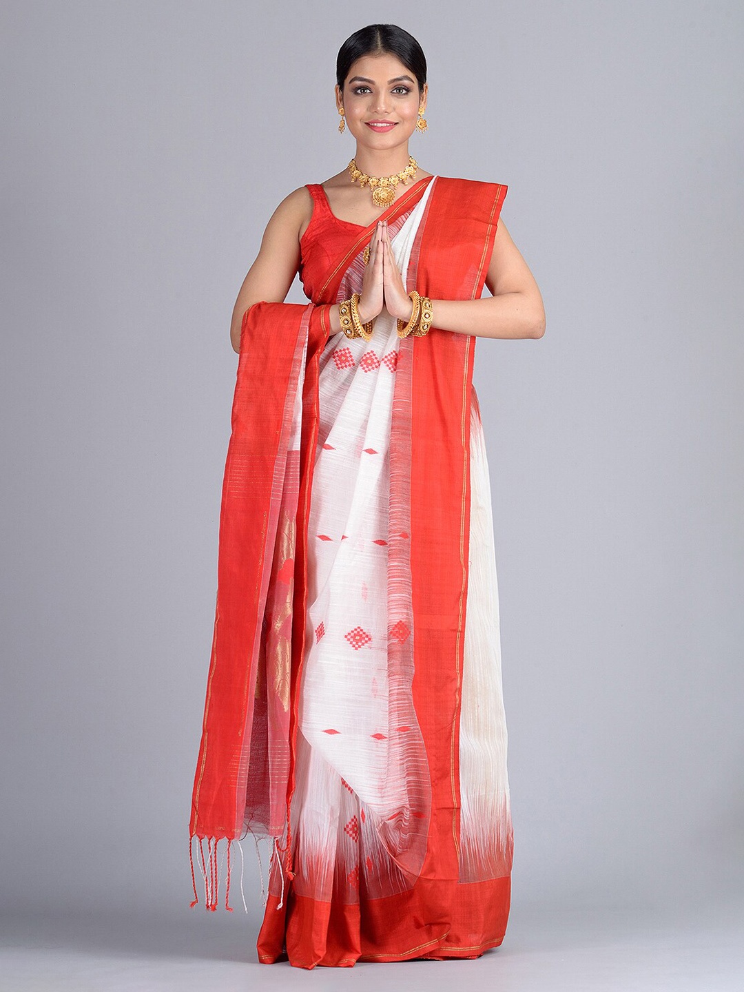 

Mitera White & Red Silk Cotton Woven Design Handloom Taant Saree