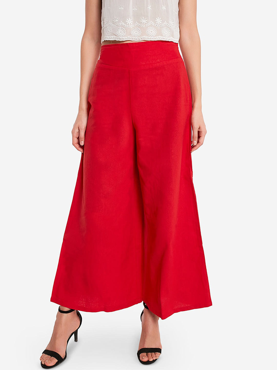 

Desi Weavess Women Red Solid Flared Palazzos