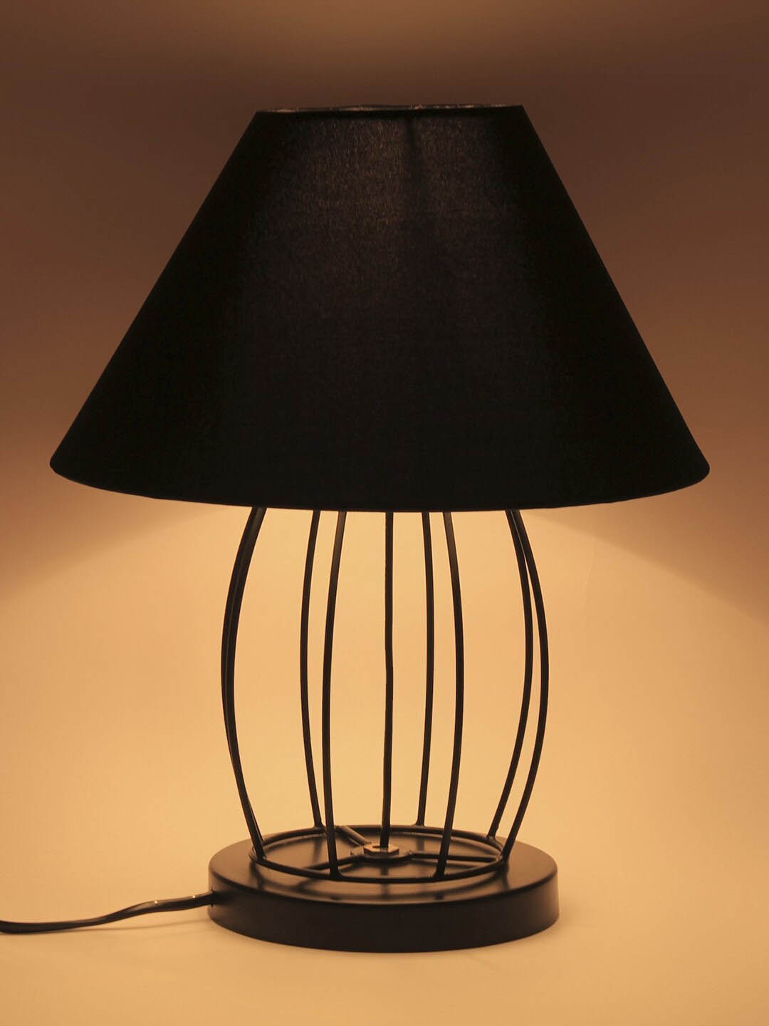 

Devansh Black Solid Contemporary Dholak Table Lamp